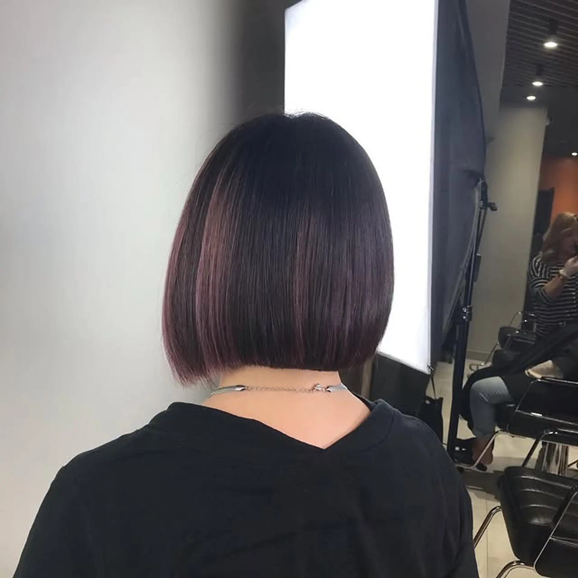 A sleek, short A-line bob with a clean and modern cut. 1