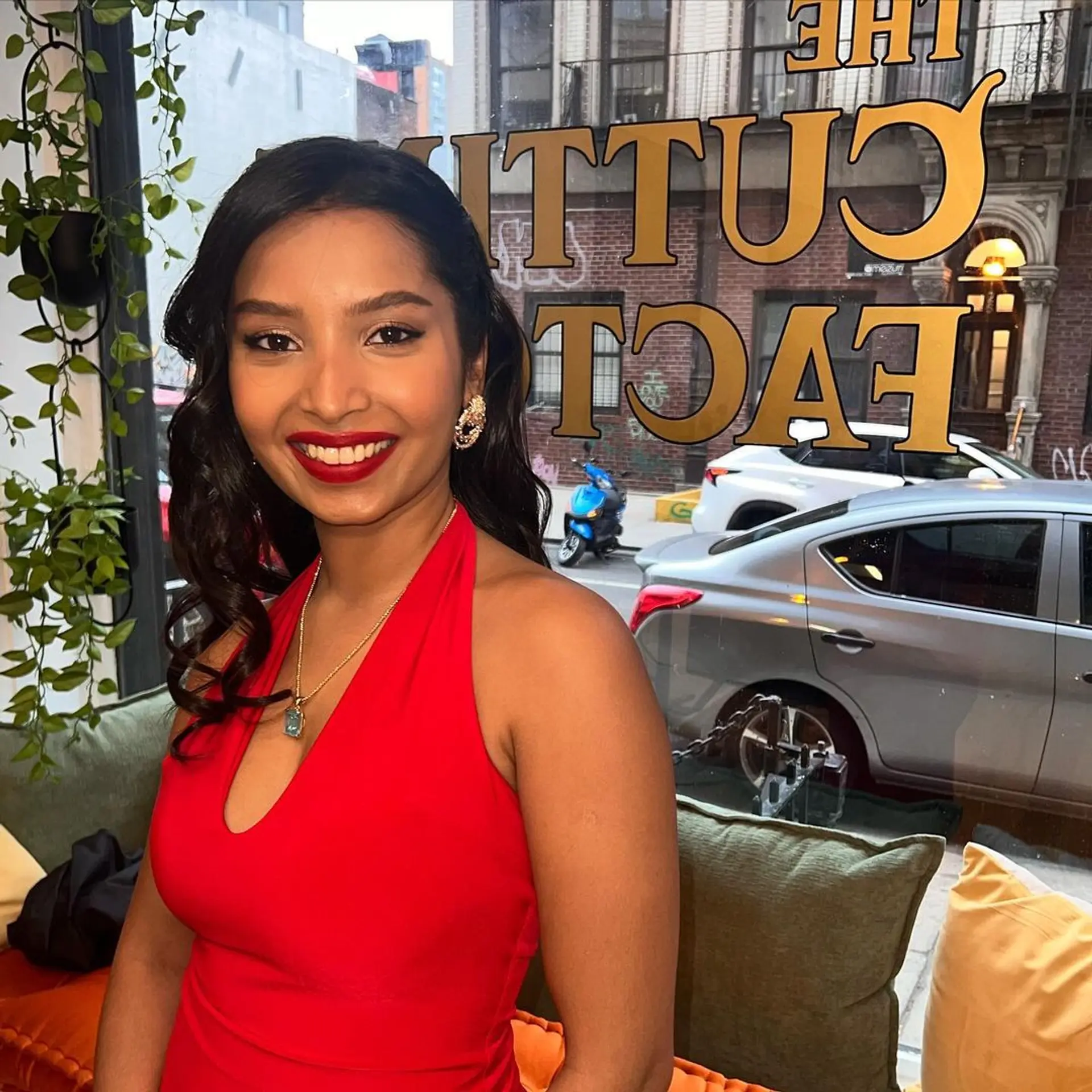 Long, wavy black hair with voluminous waves and a deep side part, finished with a glossy shine. 3