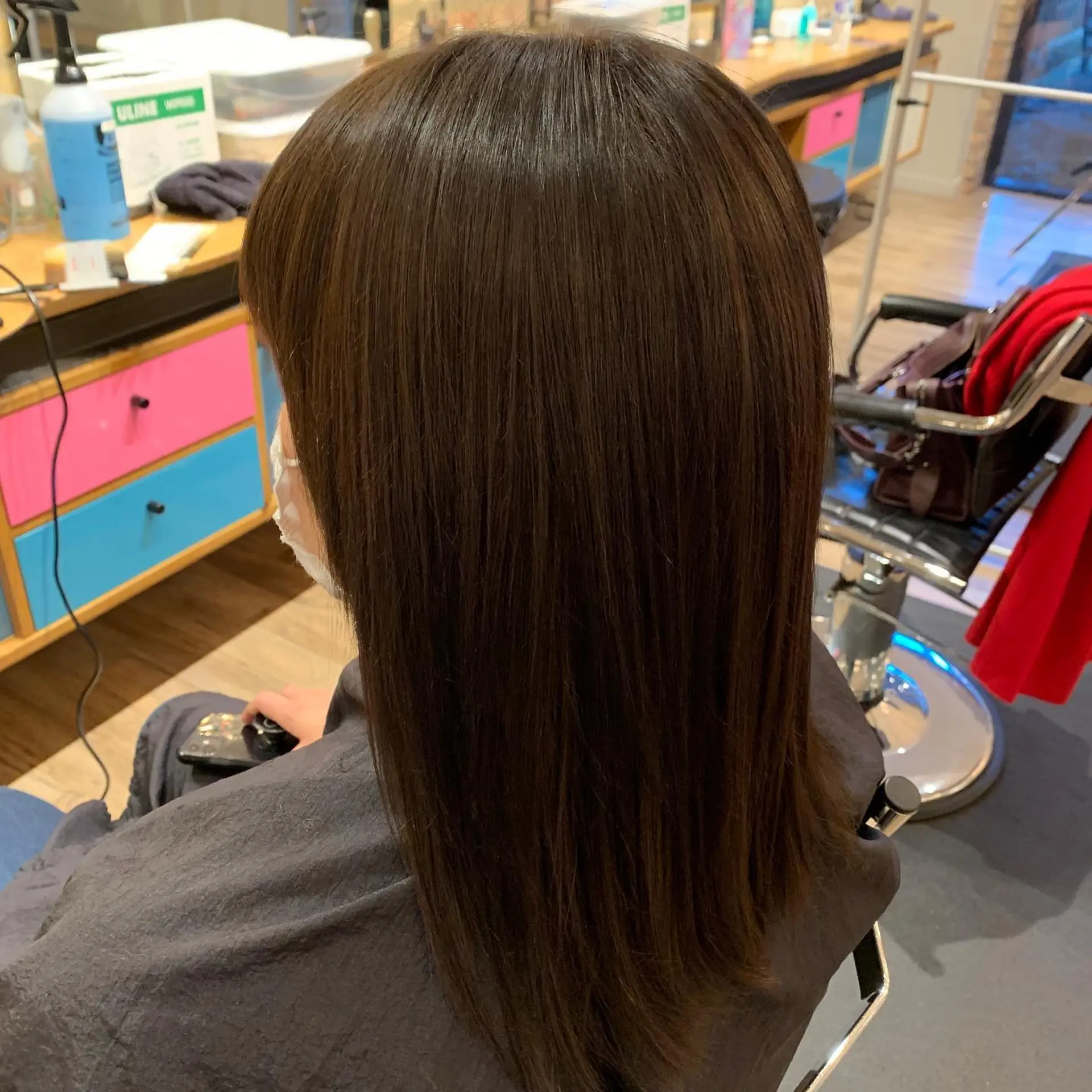 Long, straight hair with subtle layers for added movement and shape. 1