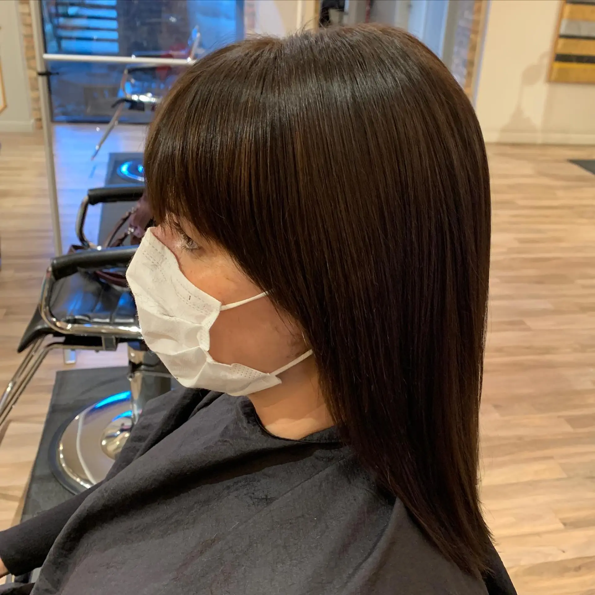 Long, straight hair with subtle layers for added movement and shape. 2