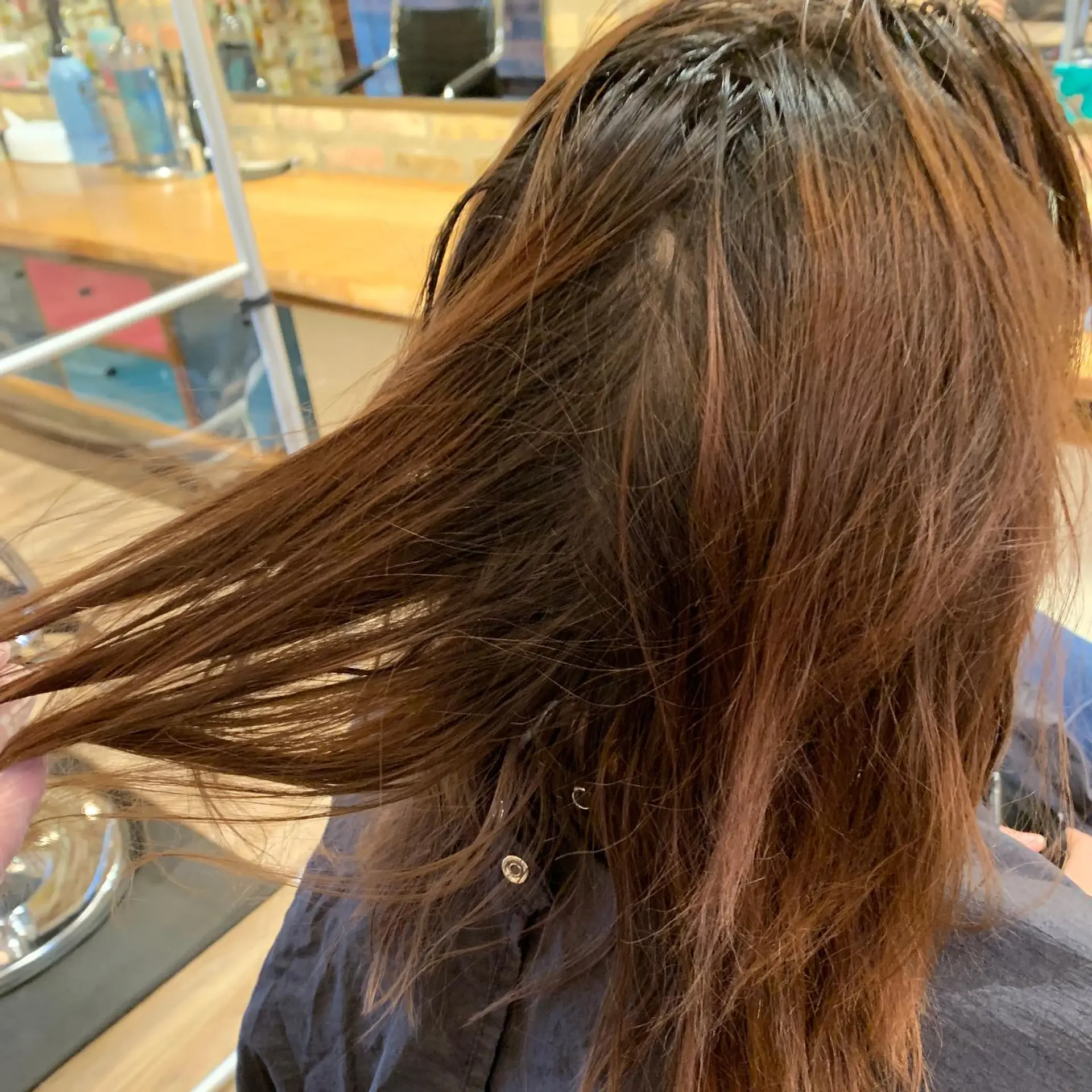 Long, straight hair with subtle layers for added movement and shape. 4