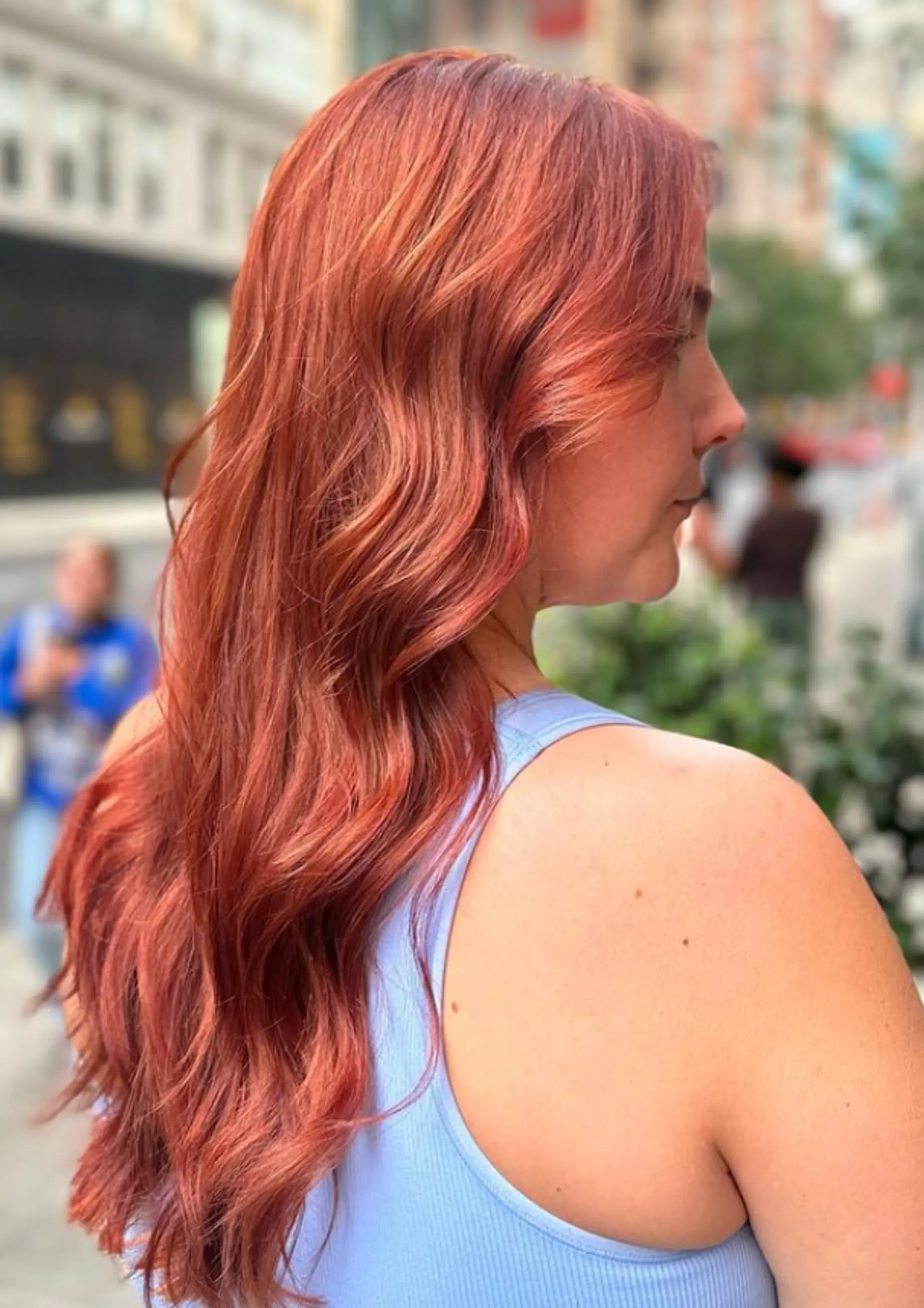 Long, auburn hair with soft, voluminous waves and a middle part, featuring subtle layers for added movement.

Color by @simabeautynyc
Cut and style by @juliamannino_hair
 2