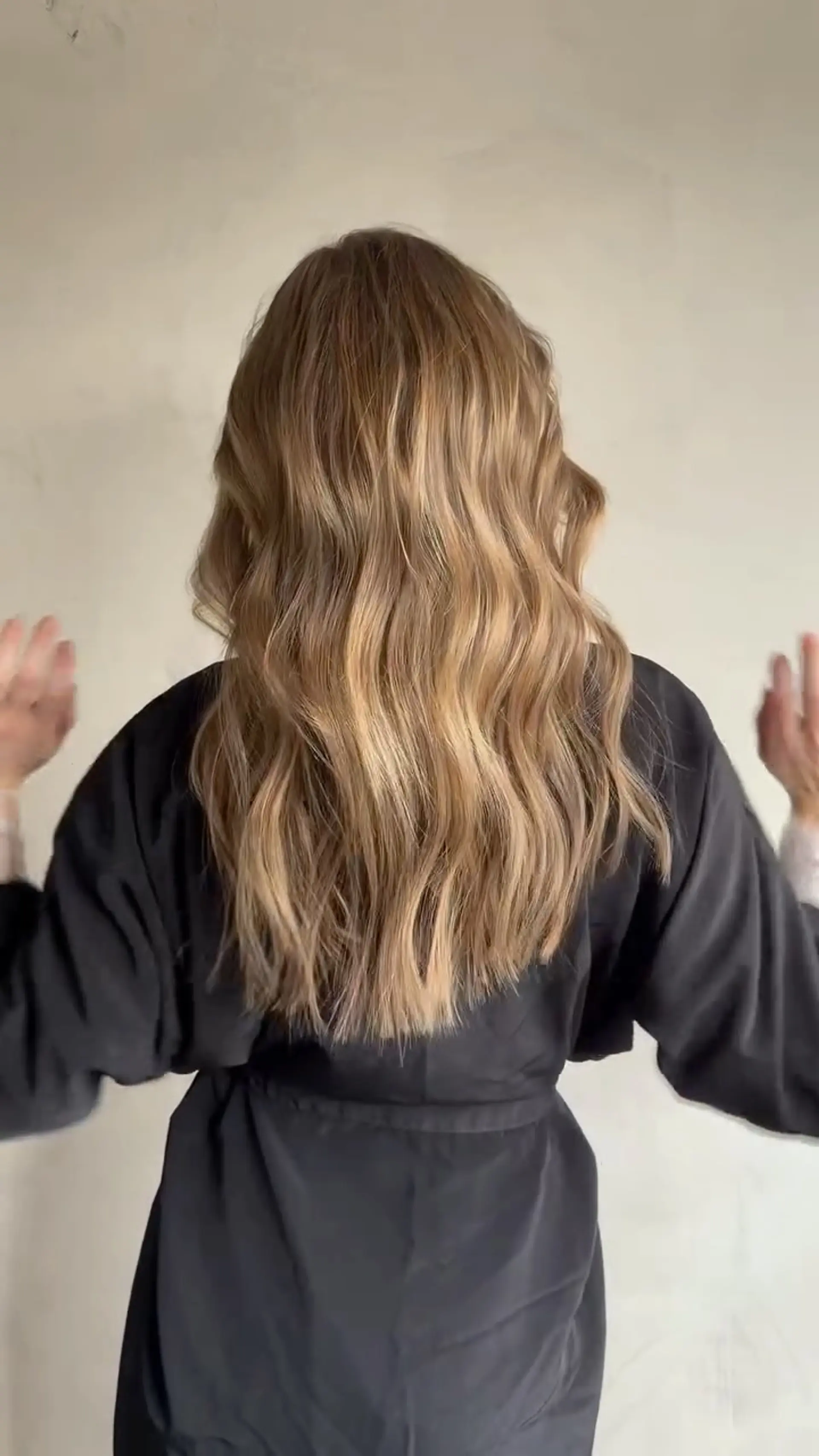 Long honey blonde hair with soft, flowing waves cascading down the back. 1