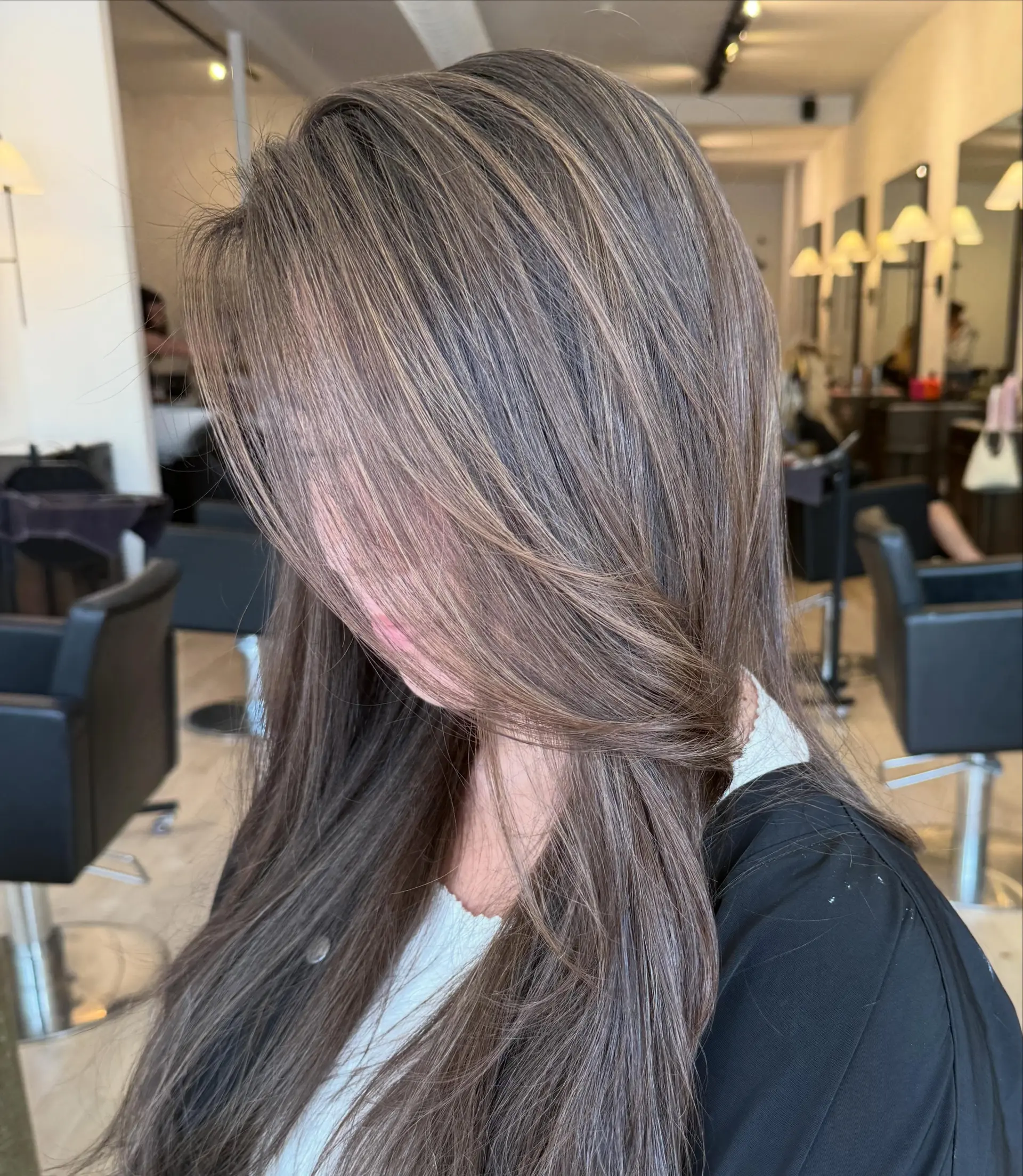 Long, smooth brunette hair detailed with fine, cool-toned dimensional highlights. 1