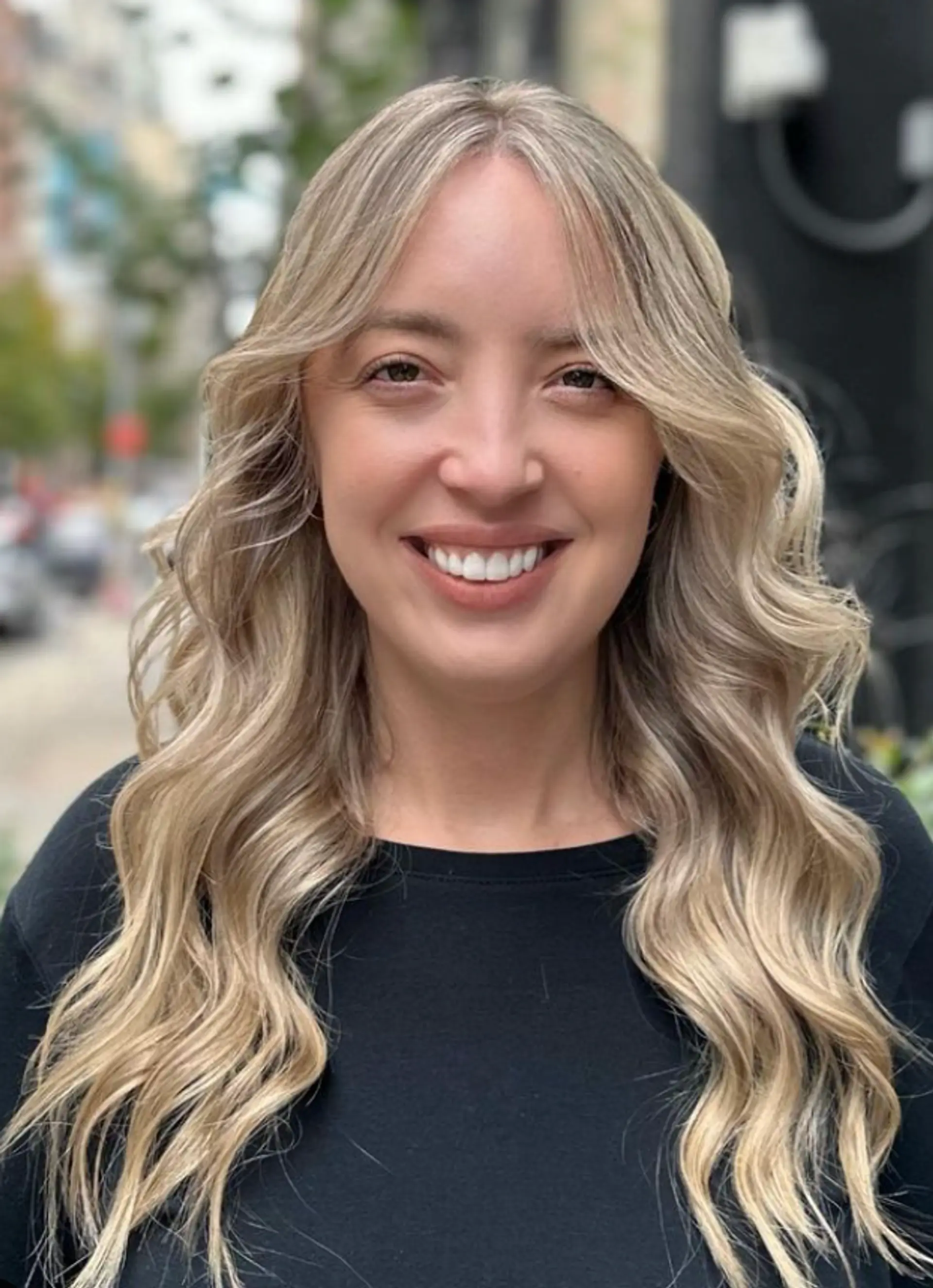 A very long, wavy hairstyle with loose waves and subtle platinum highlights on a natural blonde base, creating a sun-kissed and flowing look.

Color by @simabeautynyc
Cut and style by @juliamannino_hair
 2