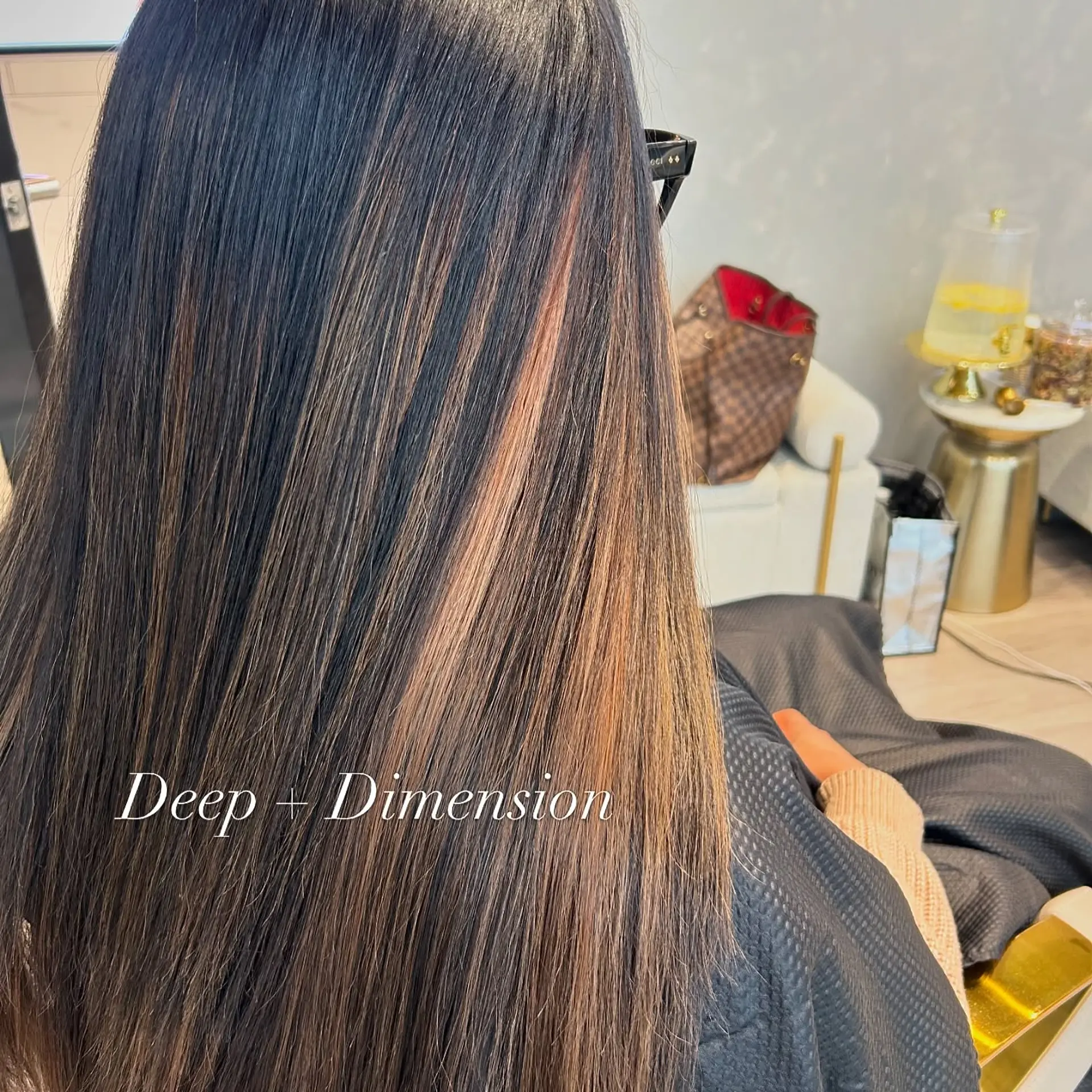 A long, layered hairstyle with waves and balayage highlights. 5