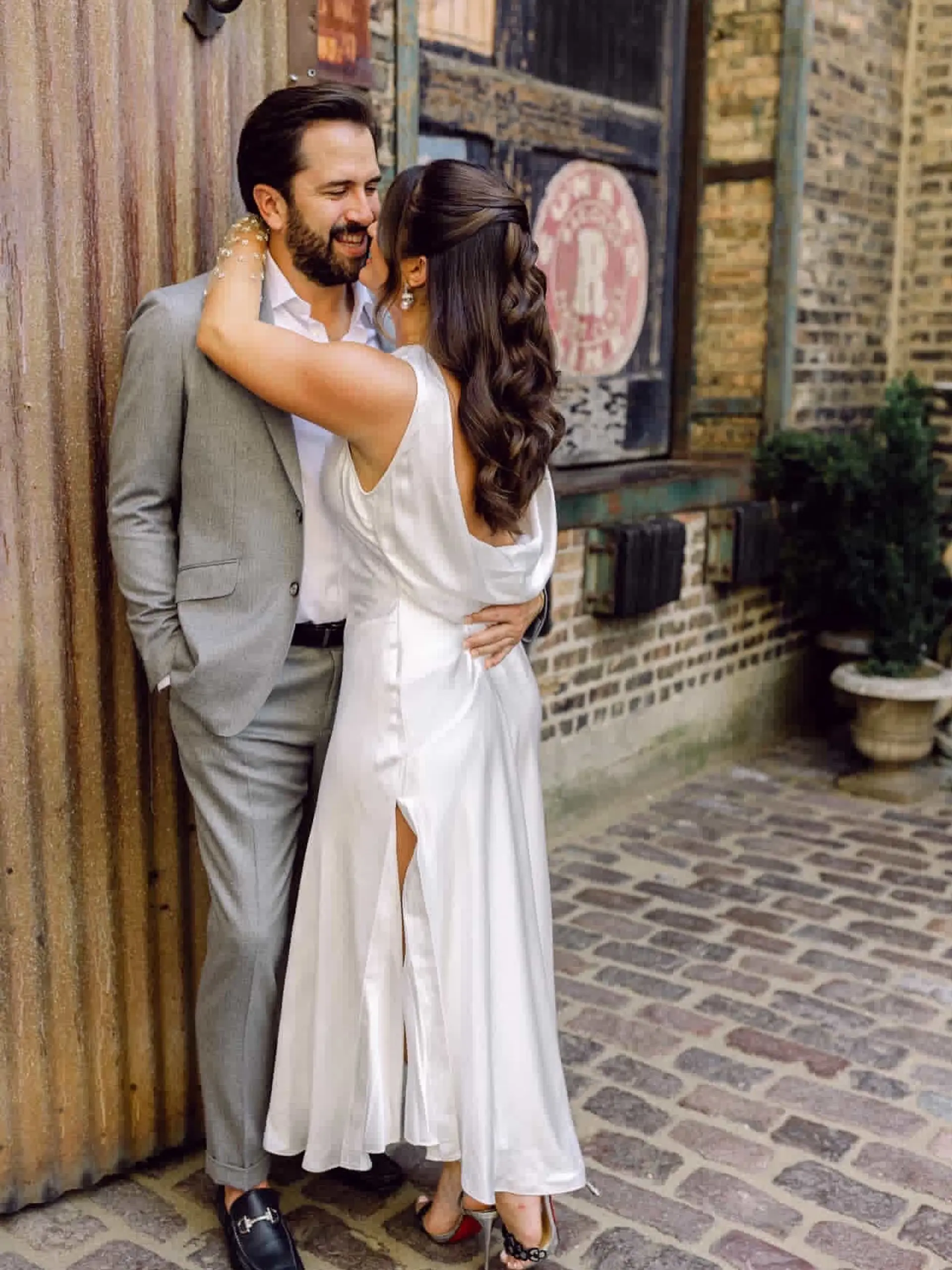 A romantic and elegant half-updo created with twisted sections of hair, cascading into soft waves. 2