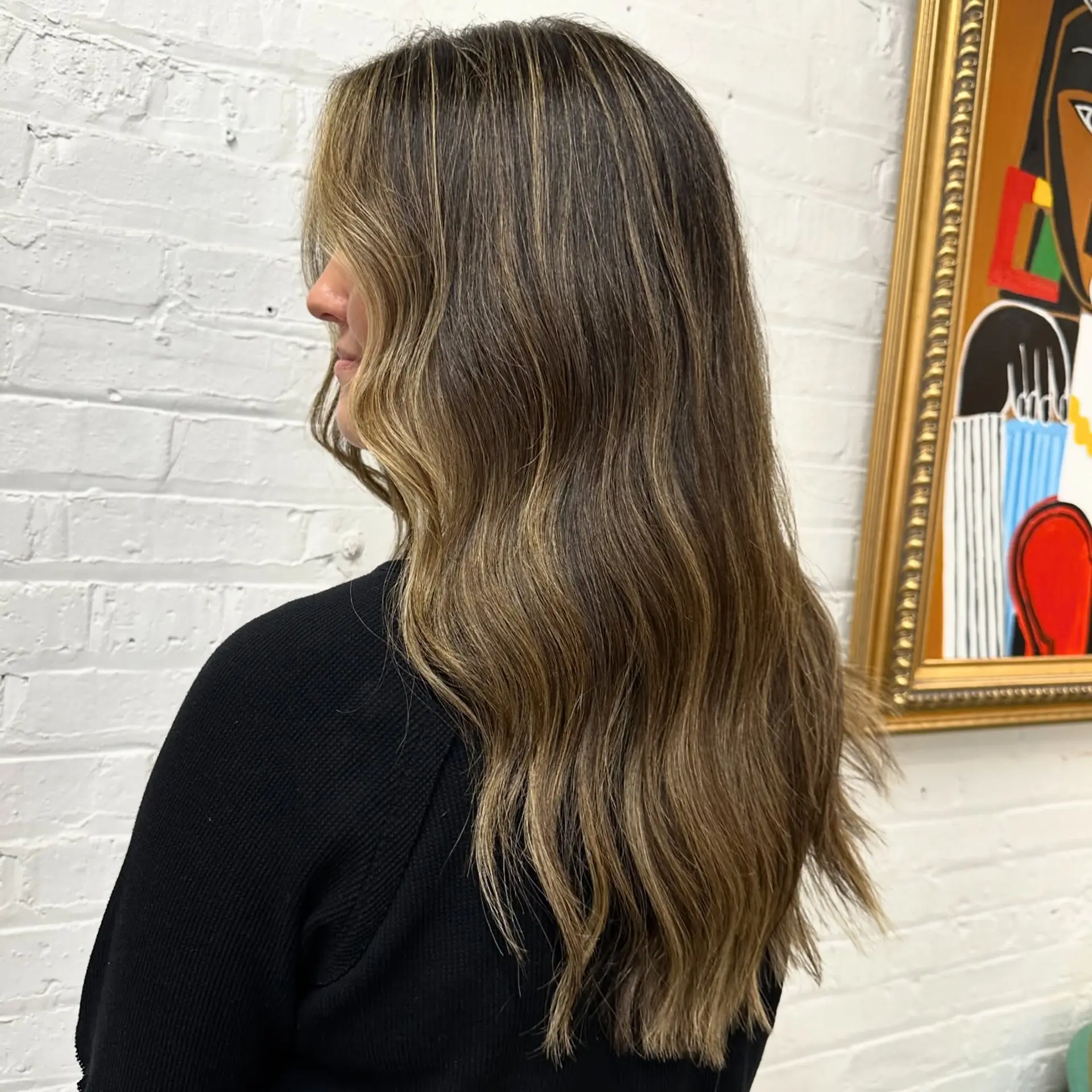 Long, layered waves with a caramel balayage. 1