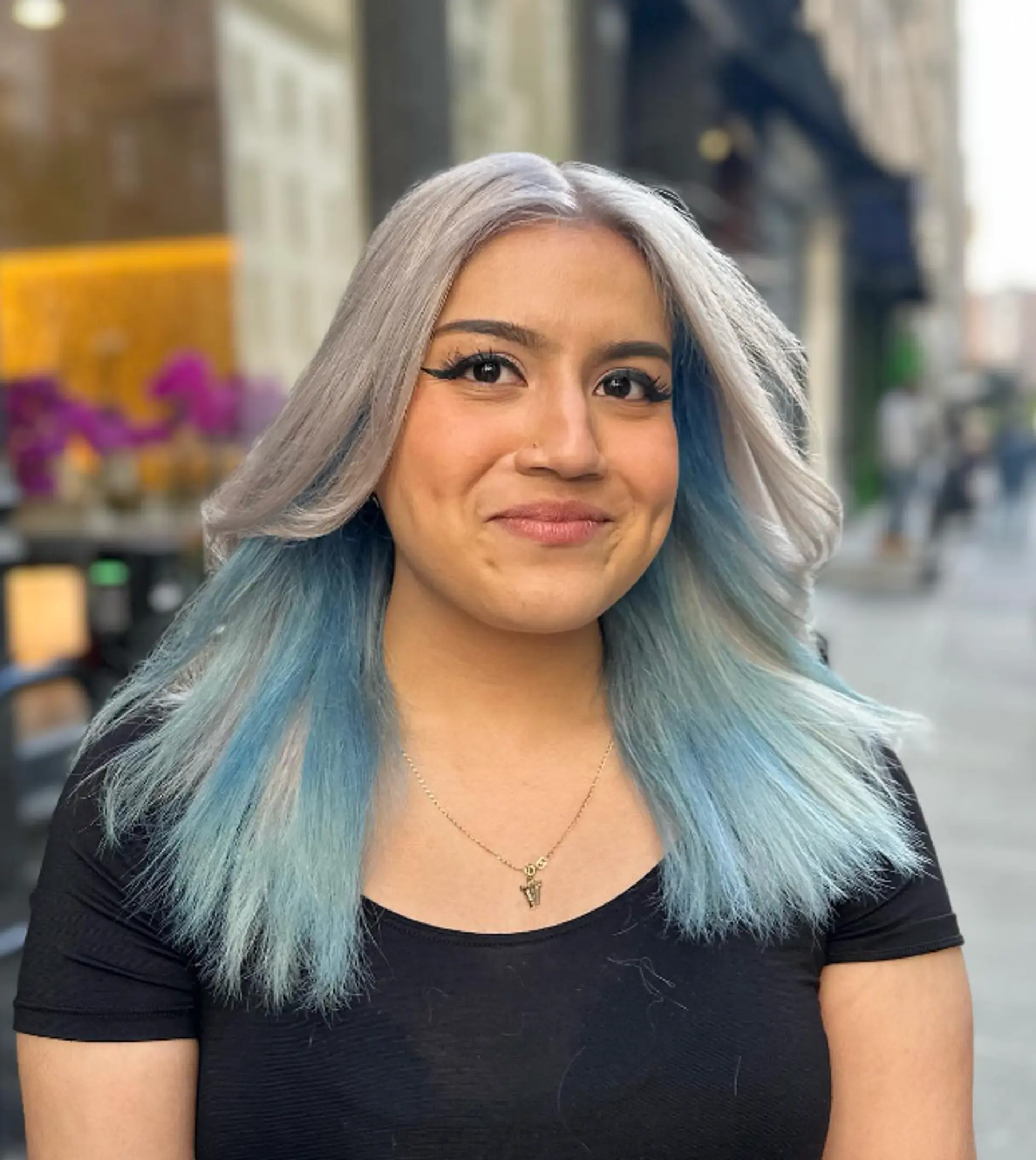 Medium-length, straight silver hair with soft waves and light blue ombre tips, featuring face-framing layers and a sleek finish.
 2