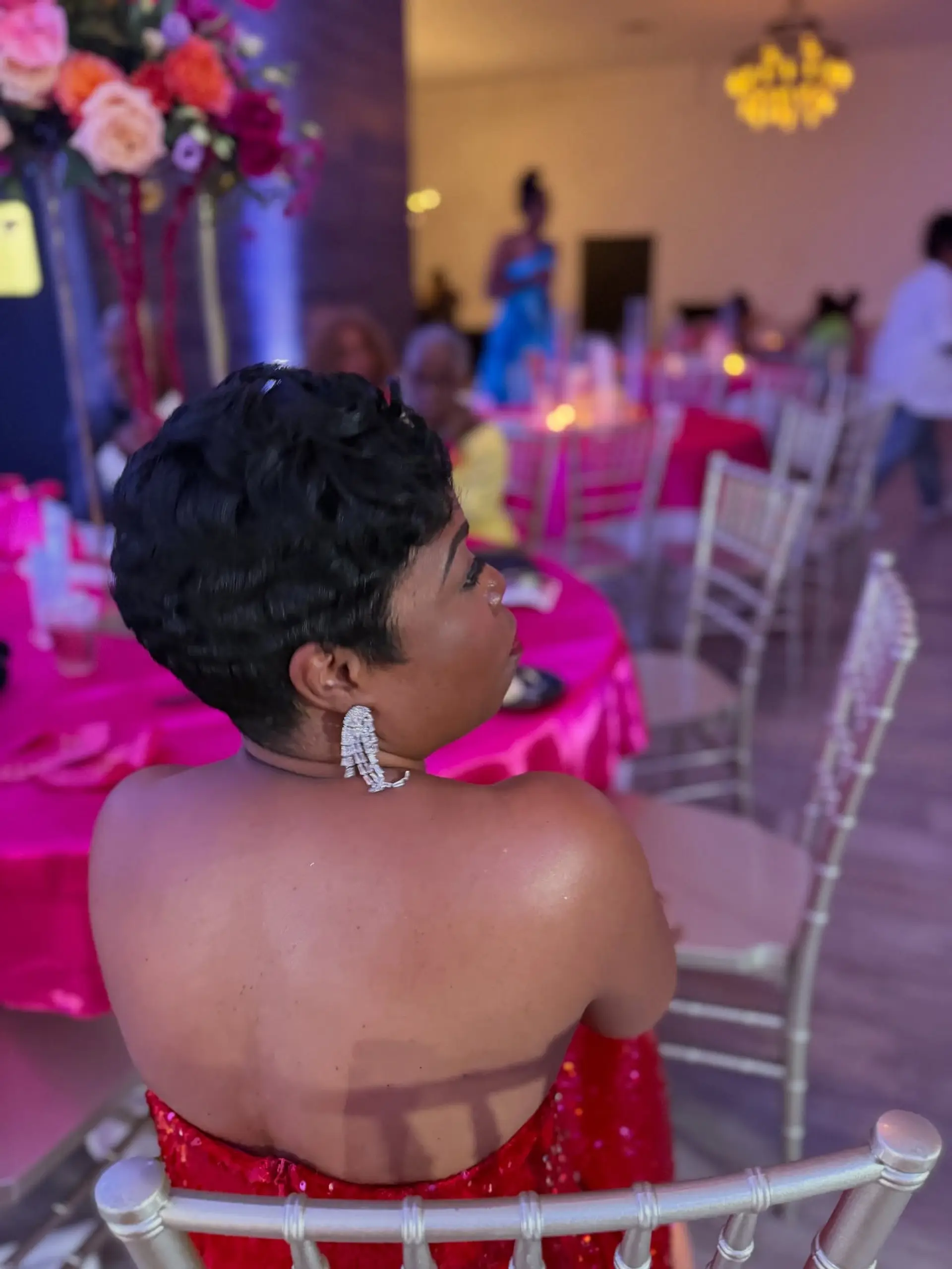 A sophisticated very short pixie cut featuring deeply defined, polished finger waves that beautifully frame the face and head, offering a timeless and elegant aesthetic. 5