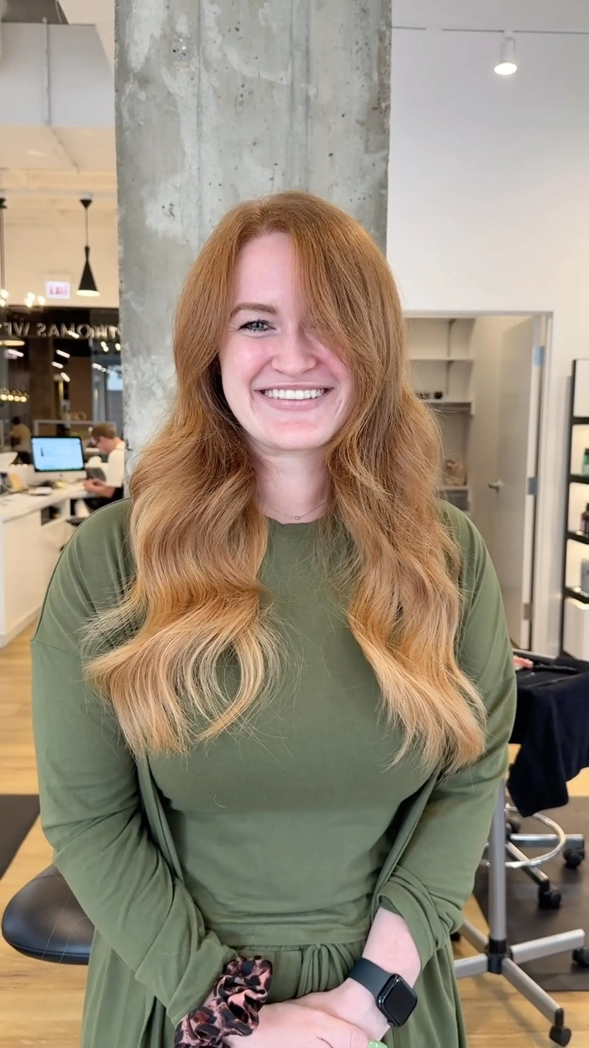 Long copper hair styled in soft, loose waves with face-framing layers. 1