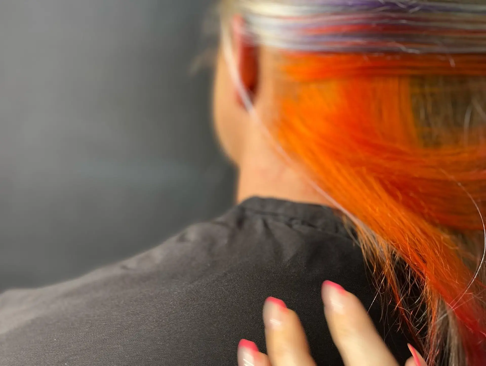 Long straight blonde hair with hidden vibrant color panels underneath. 2