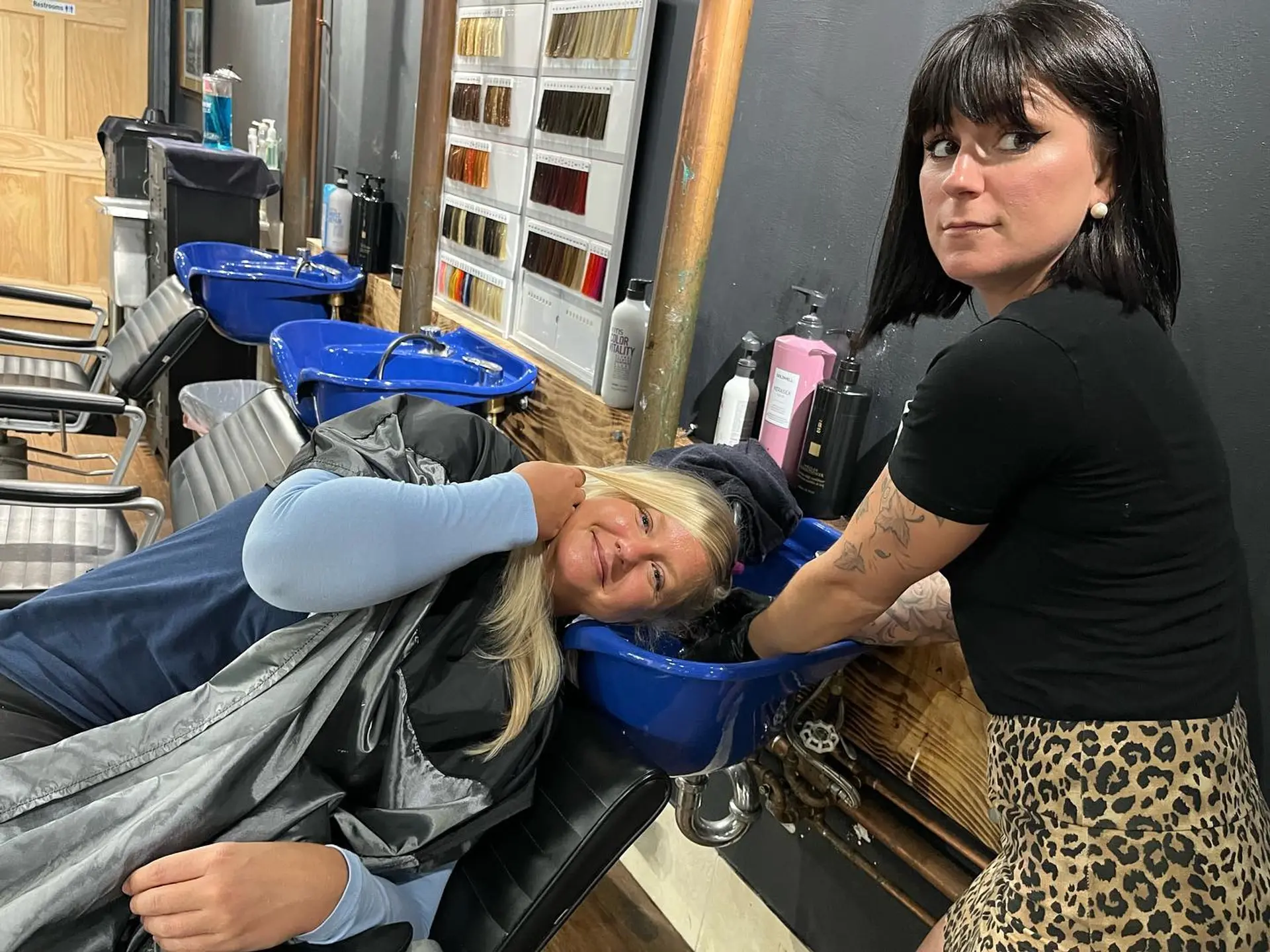 Long straight blonde hair with hidden vibrant color panels underneath. 3