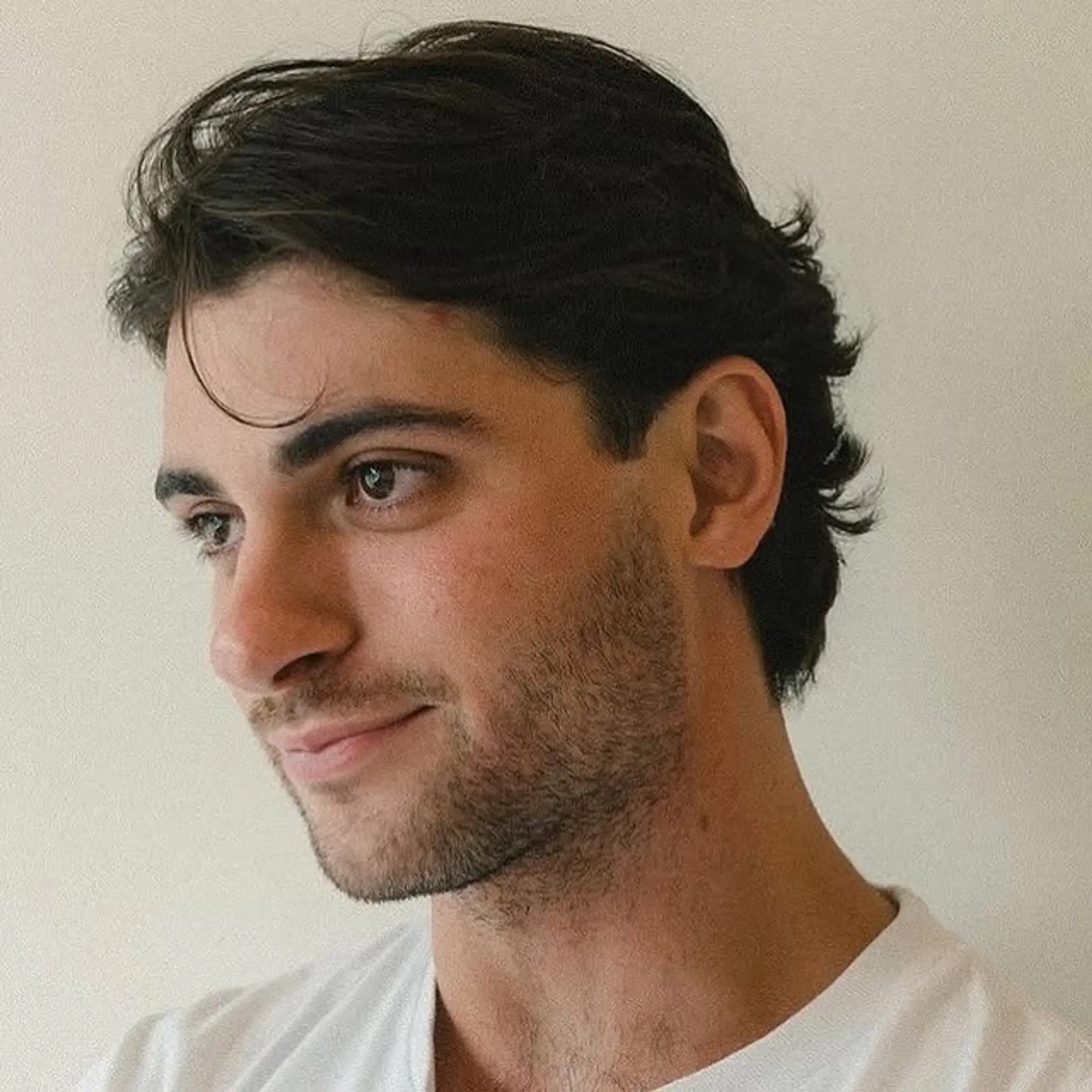 A modern take on the classic mullet, featuring soft layers and tapered sides for a stylish and manageable look. 1