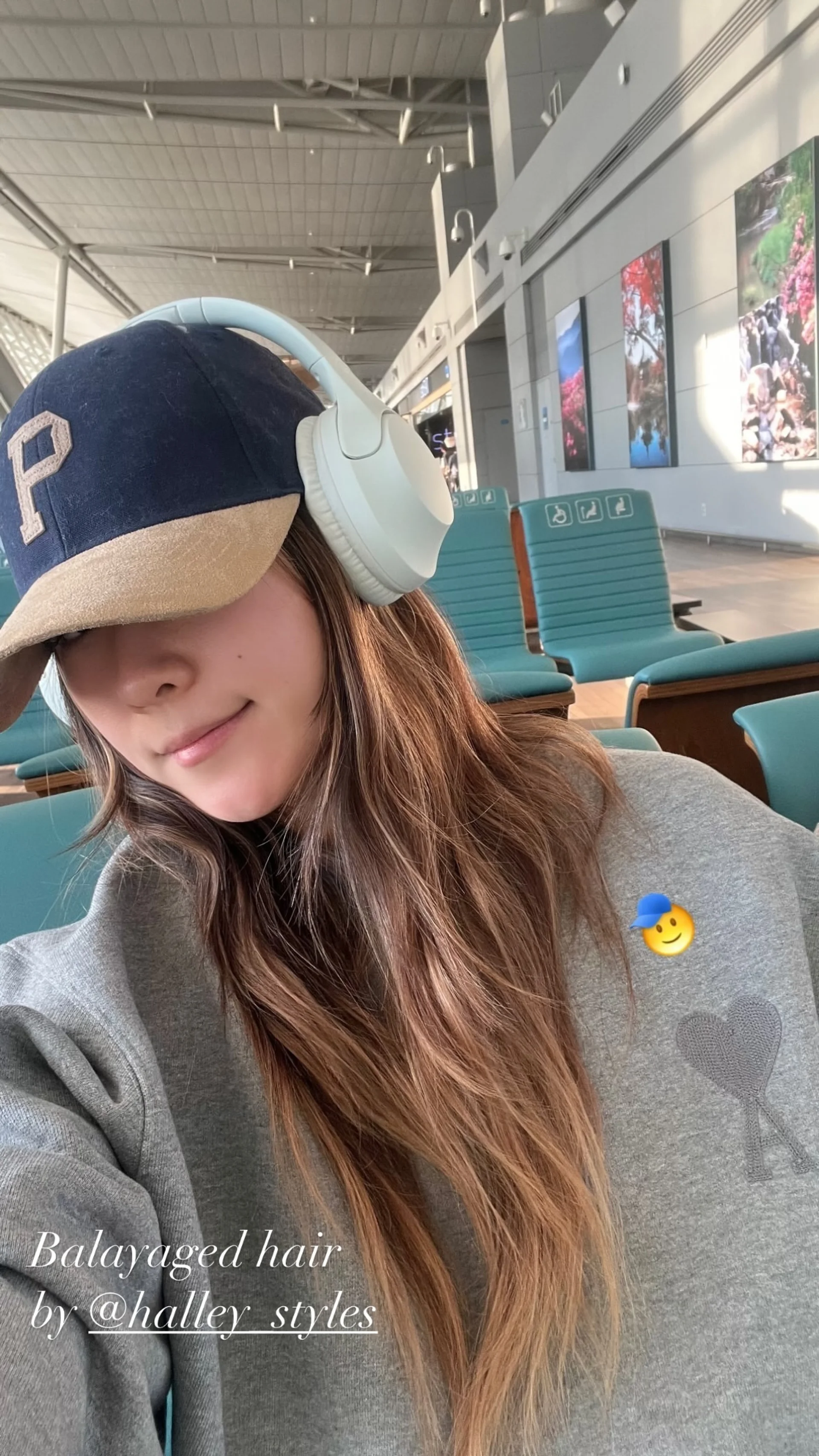 Soft, medium-length wavy hairstyle with natural blonde tones and a subtle side part, exuding a sun-kissed elegance. - Preview 1