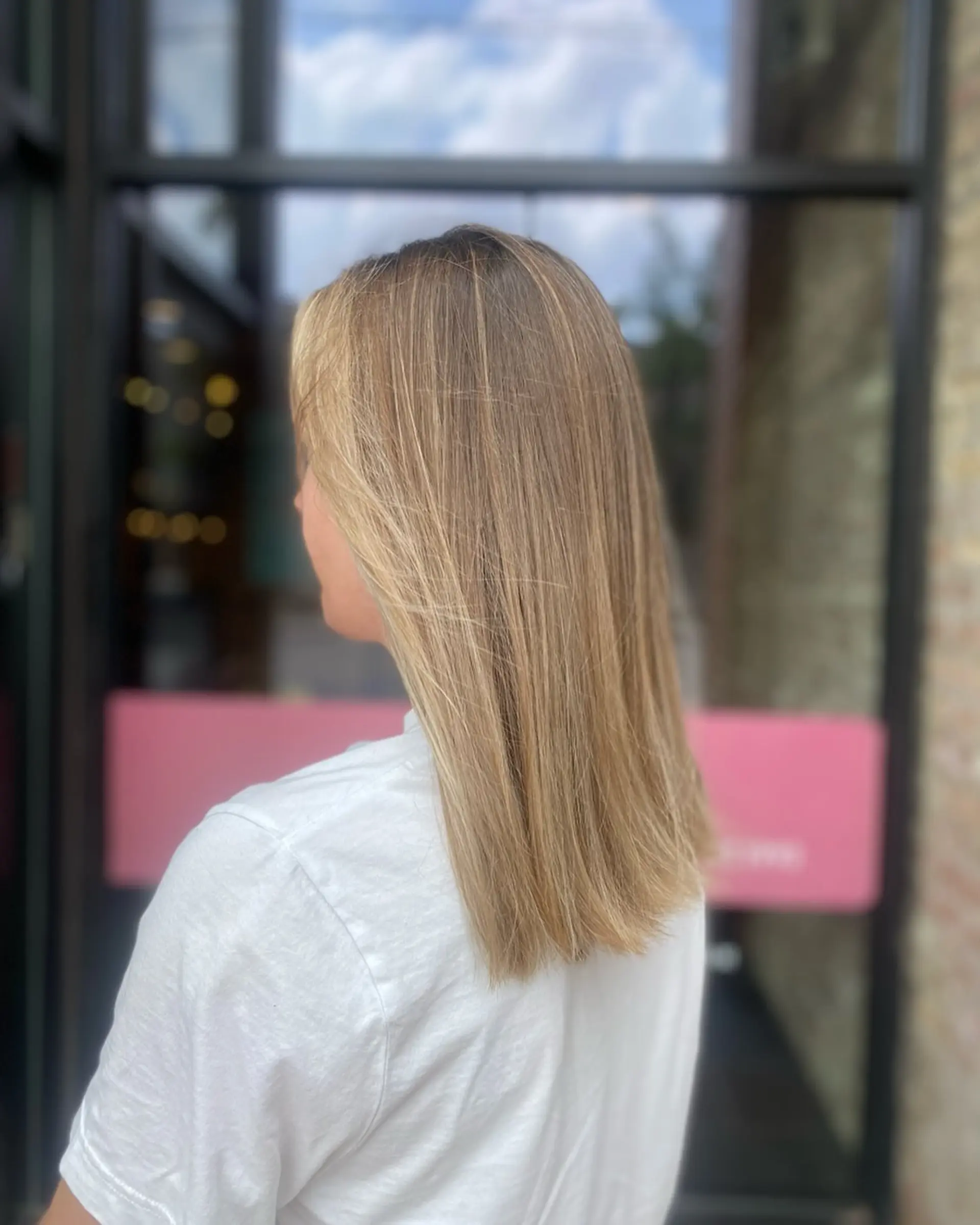 A medium length lob with a blonde balayage. 1