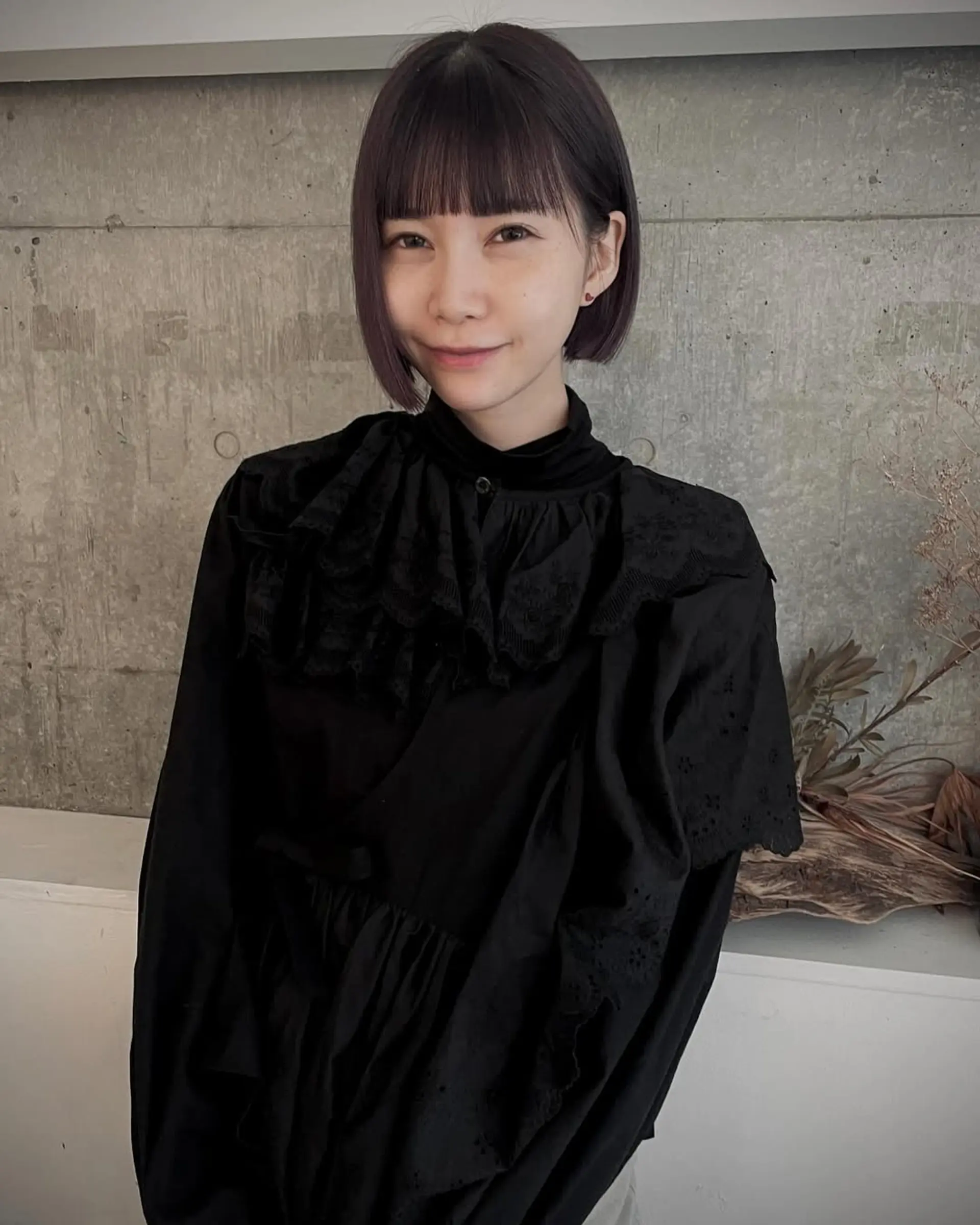 A precision-cut sleek bob with blunt ends and a smooth finish, offering a modern and minimalist look. 3