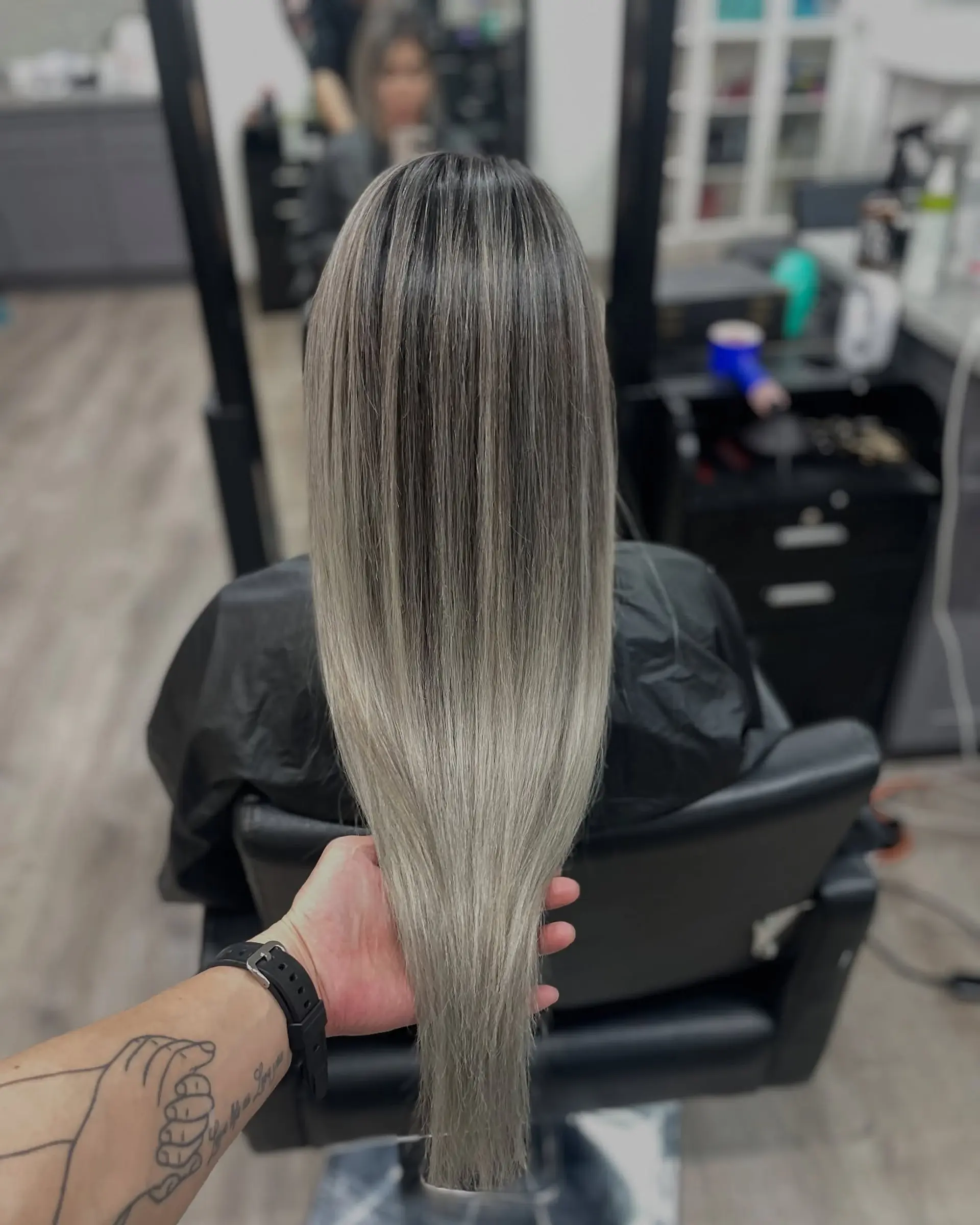 A stylish ombre from black to silver ash blonde. 1