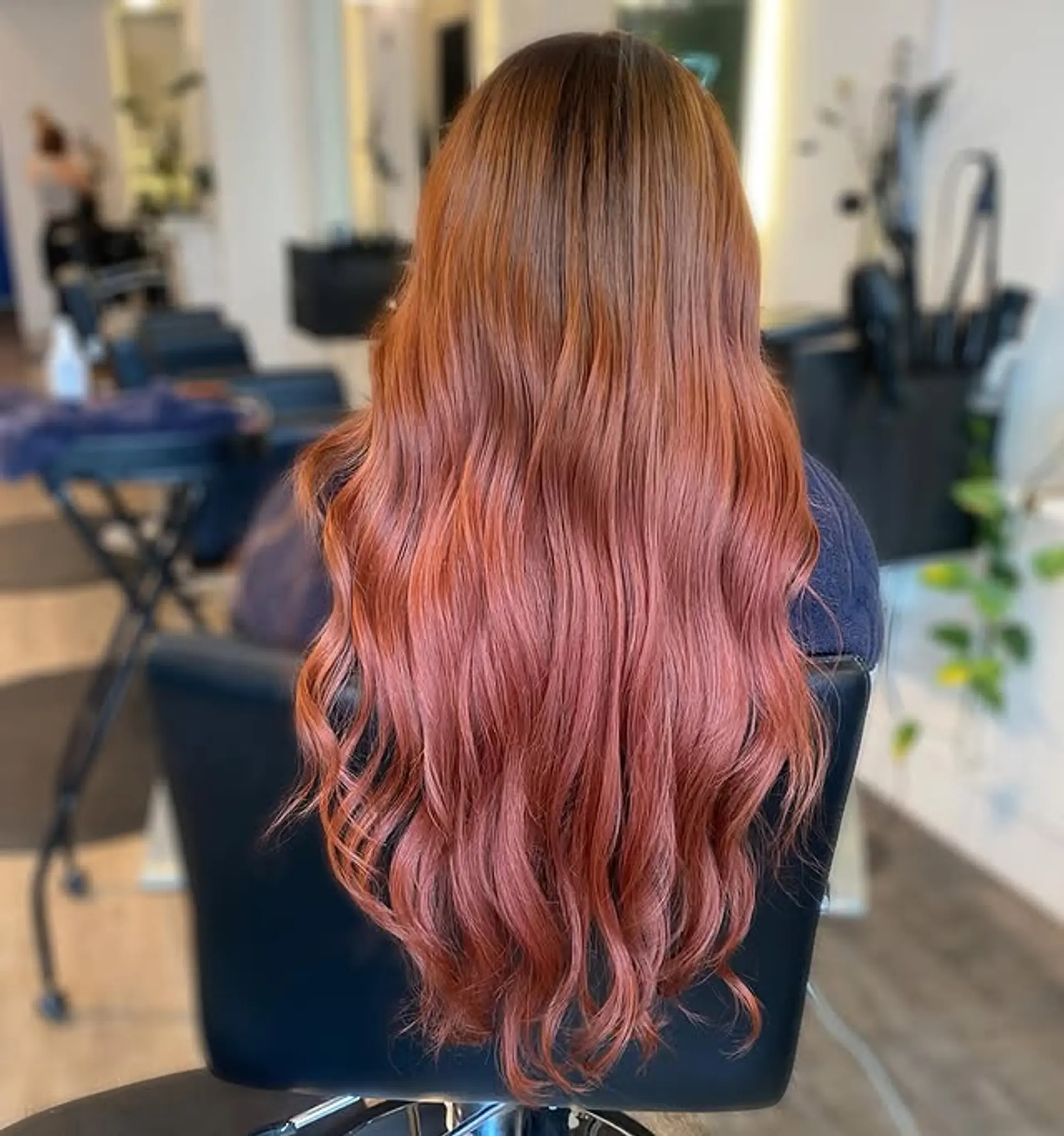 Copper and rose gold balayage with loose waves. 1