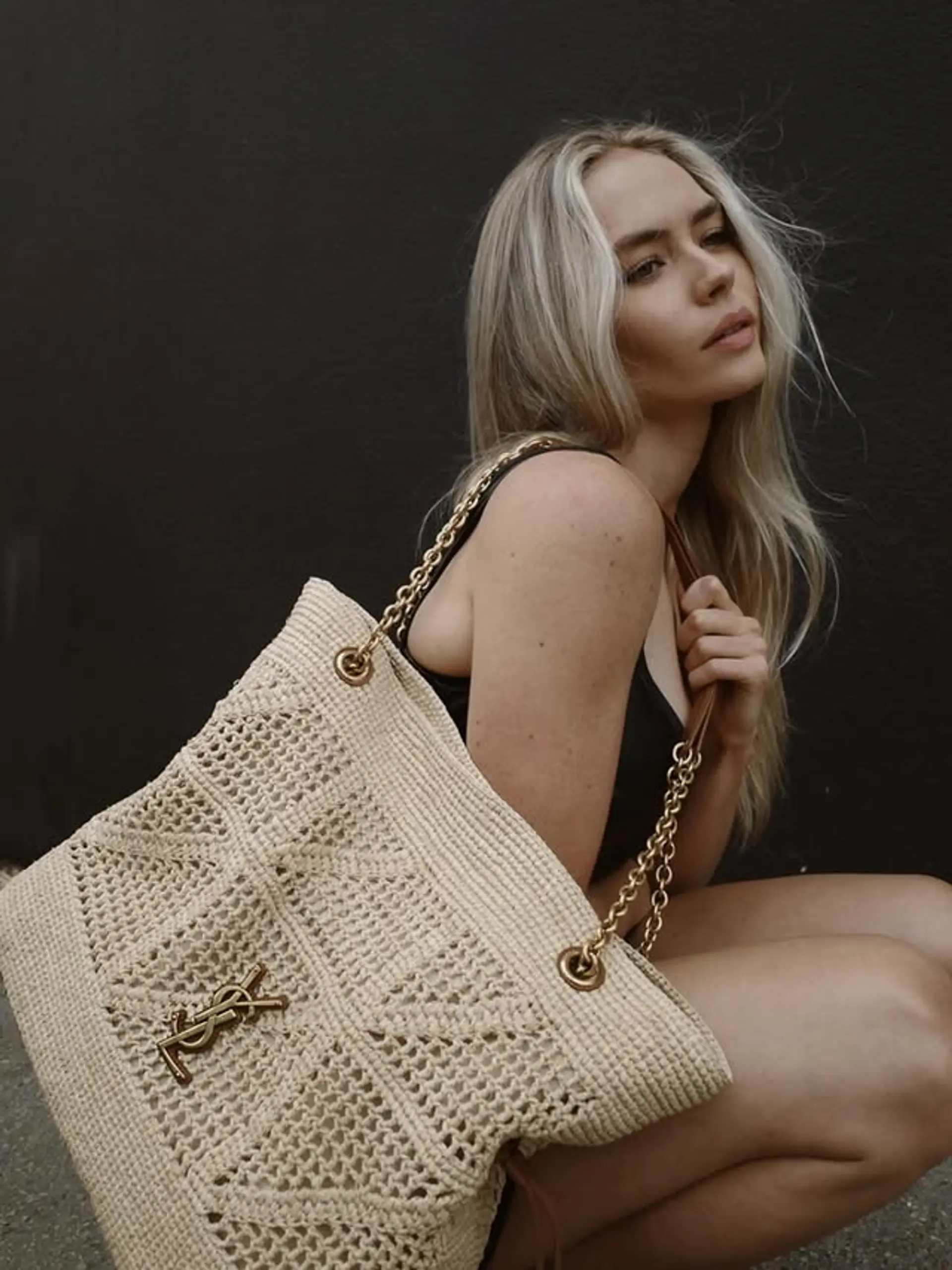 Long, platinum blonde hair with loose, beachy waves and face-framing layers. 1