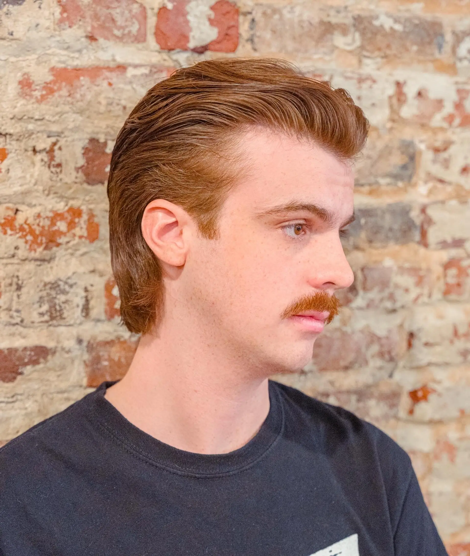 A modern take on the classic mullet, with a clean, styled front and slightly longer back. 1