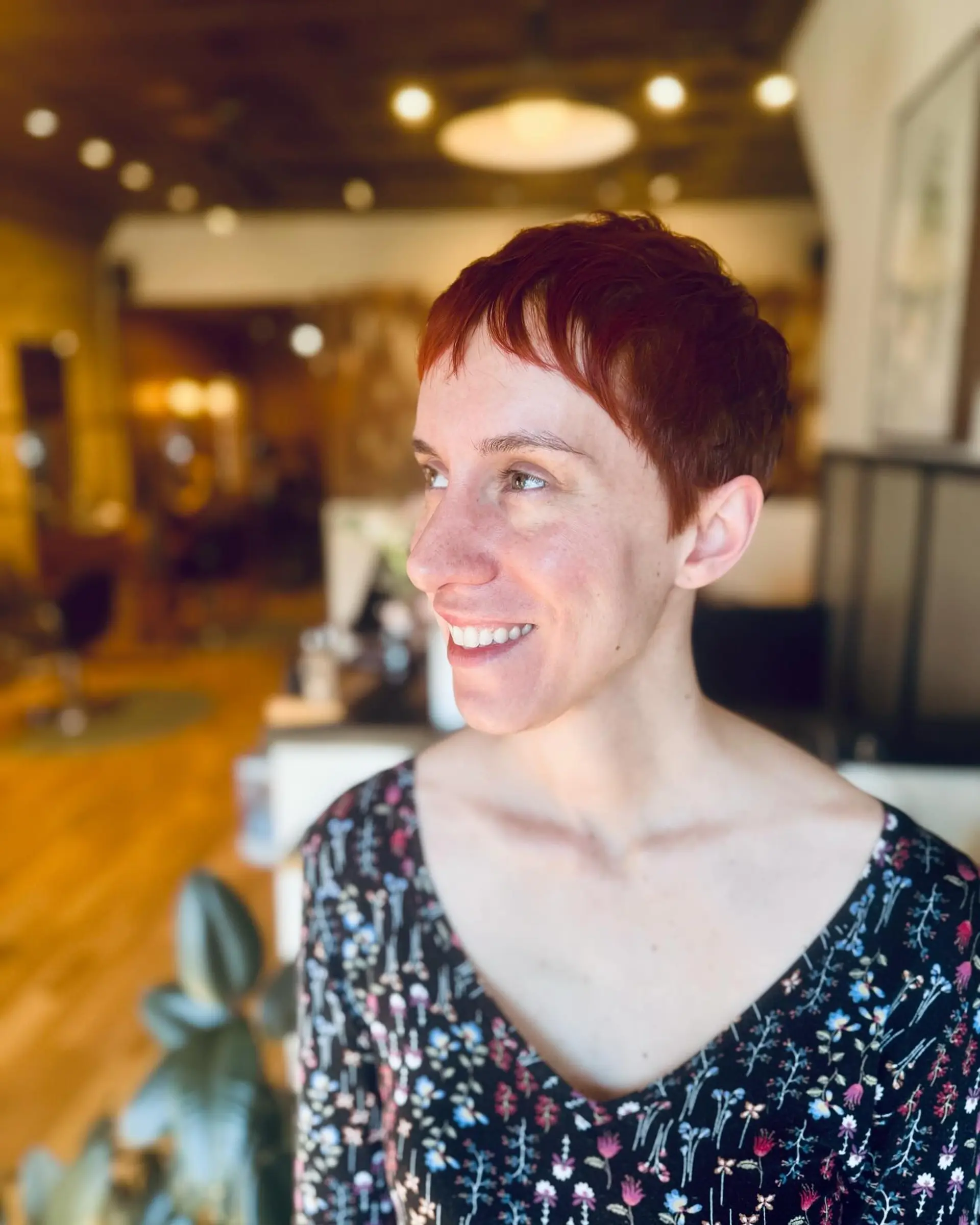 A short, copper-colored pixie cut with texture. 2