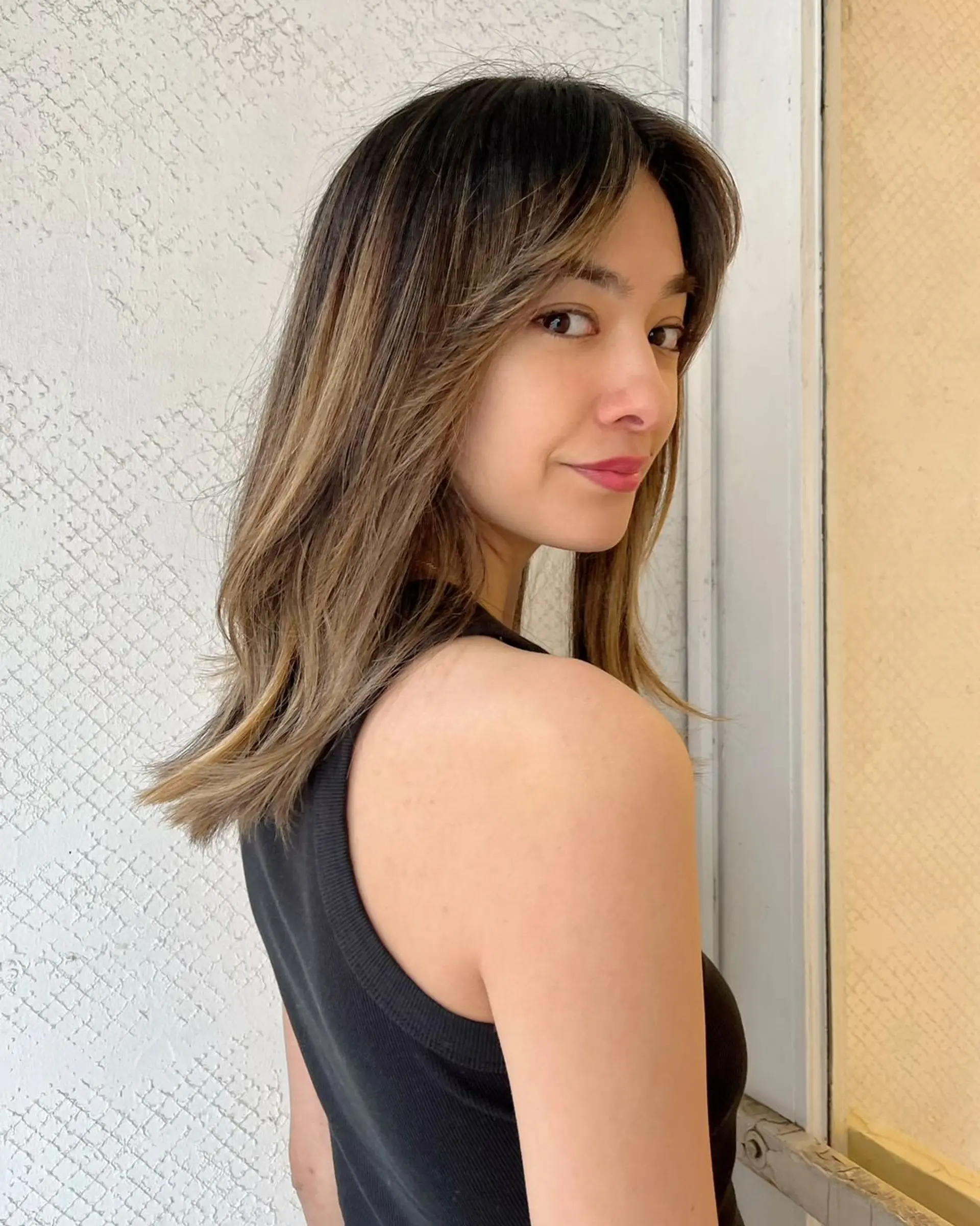 Medium-length straight hair with layers, dark brown base, and honey blonde highlights. 1