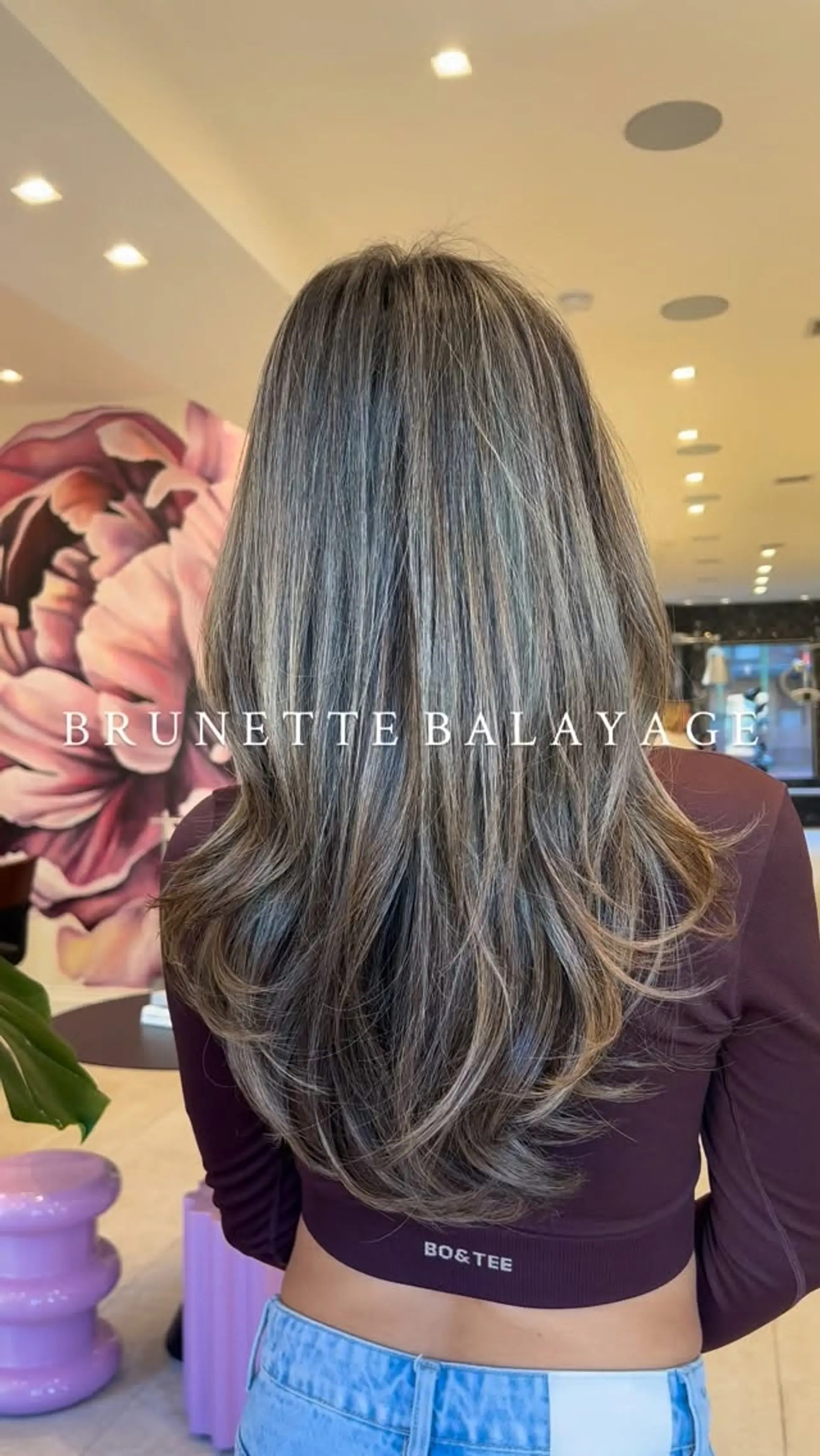 Long ash brunette hair with delicate cool-toned balayage highlights, cut with flowing layers and styled in a bouncy blowout. 1