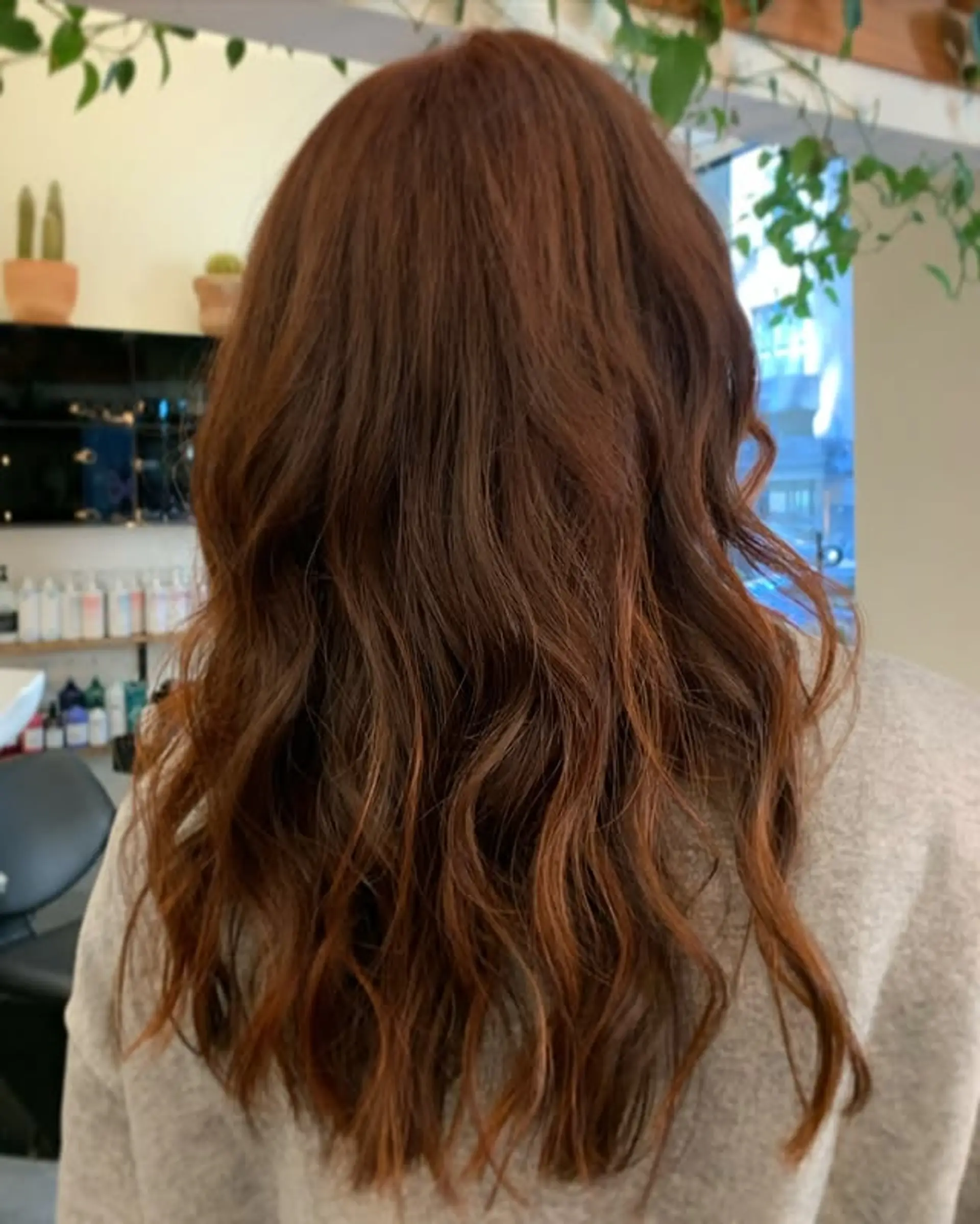 A wavy lob with auburn balayage or bronde color. 1