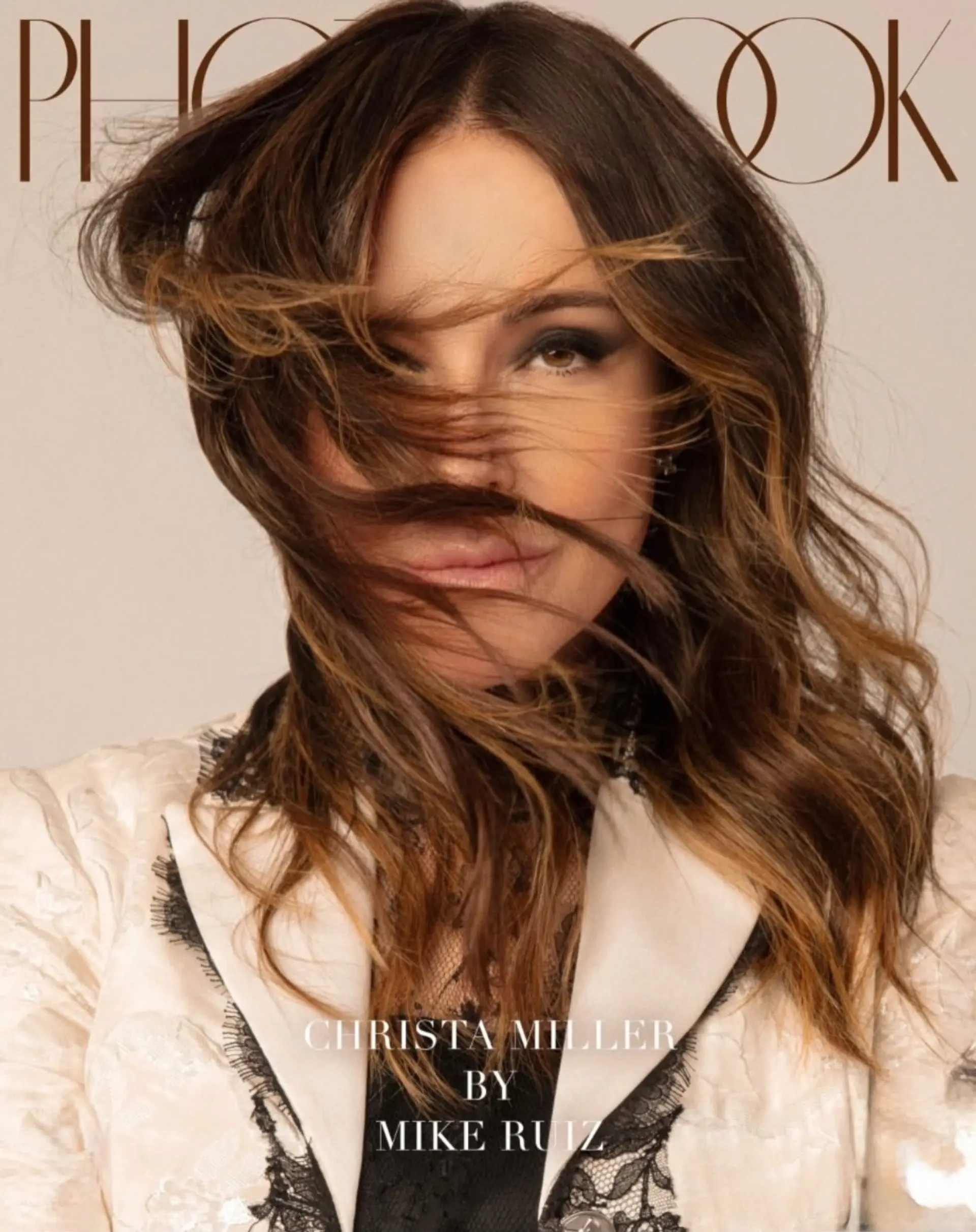Tousled shoulder-length wavy hair with soft warm caramel balayage highlights flowing naturally across the face. 1