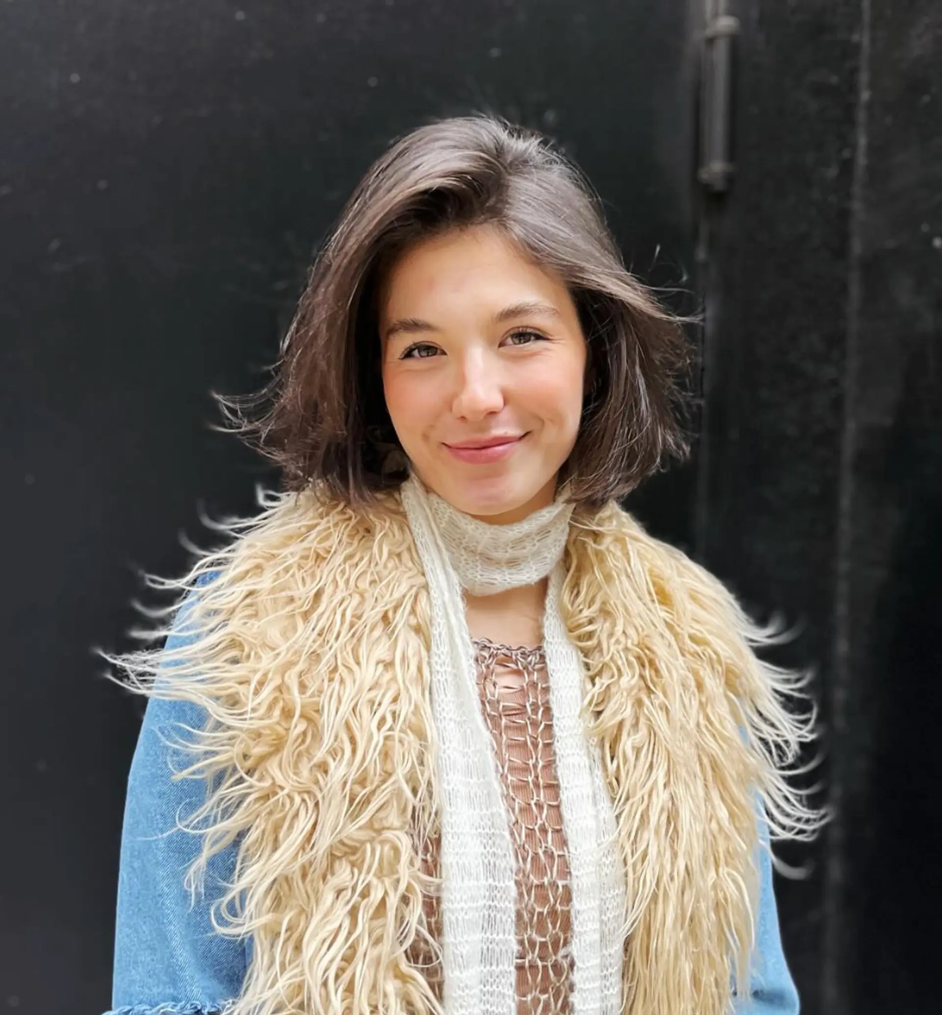 A dark brown short bob cut with a side part, layered for volume and slightly tousled for a casual yet elegant look.

Cut and style by @juliamannino_hair 1