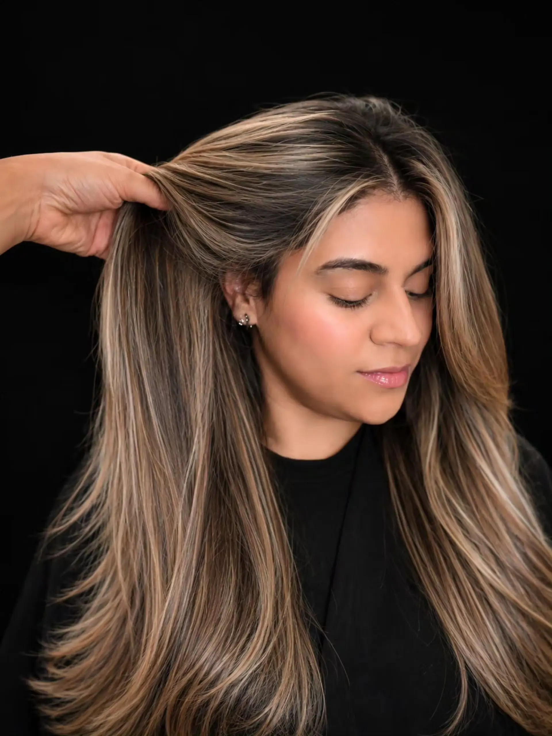 Long brown hair featuring fine ash blonde highlights and face-framing layers. 1