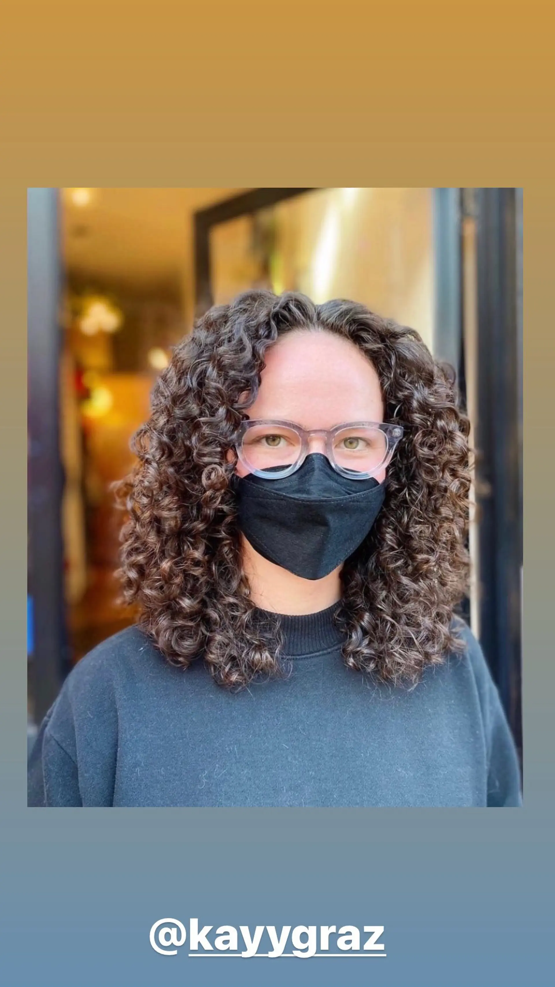 A classic bob cut that is curly and cut to medium length. 1