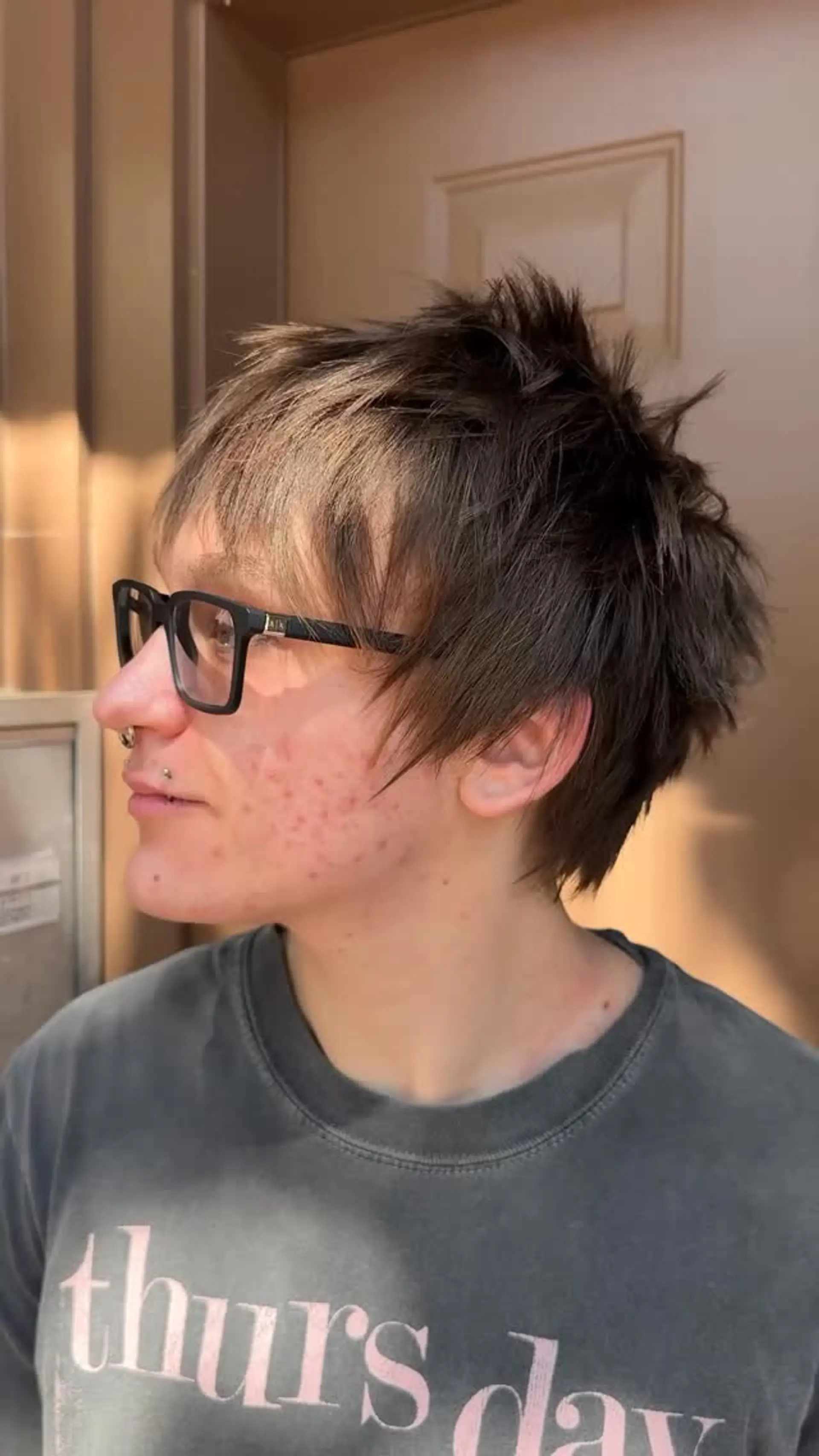 Heavily textured short cut with choppy, razored layers, piecey bangs, and a tapered nape. 1