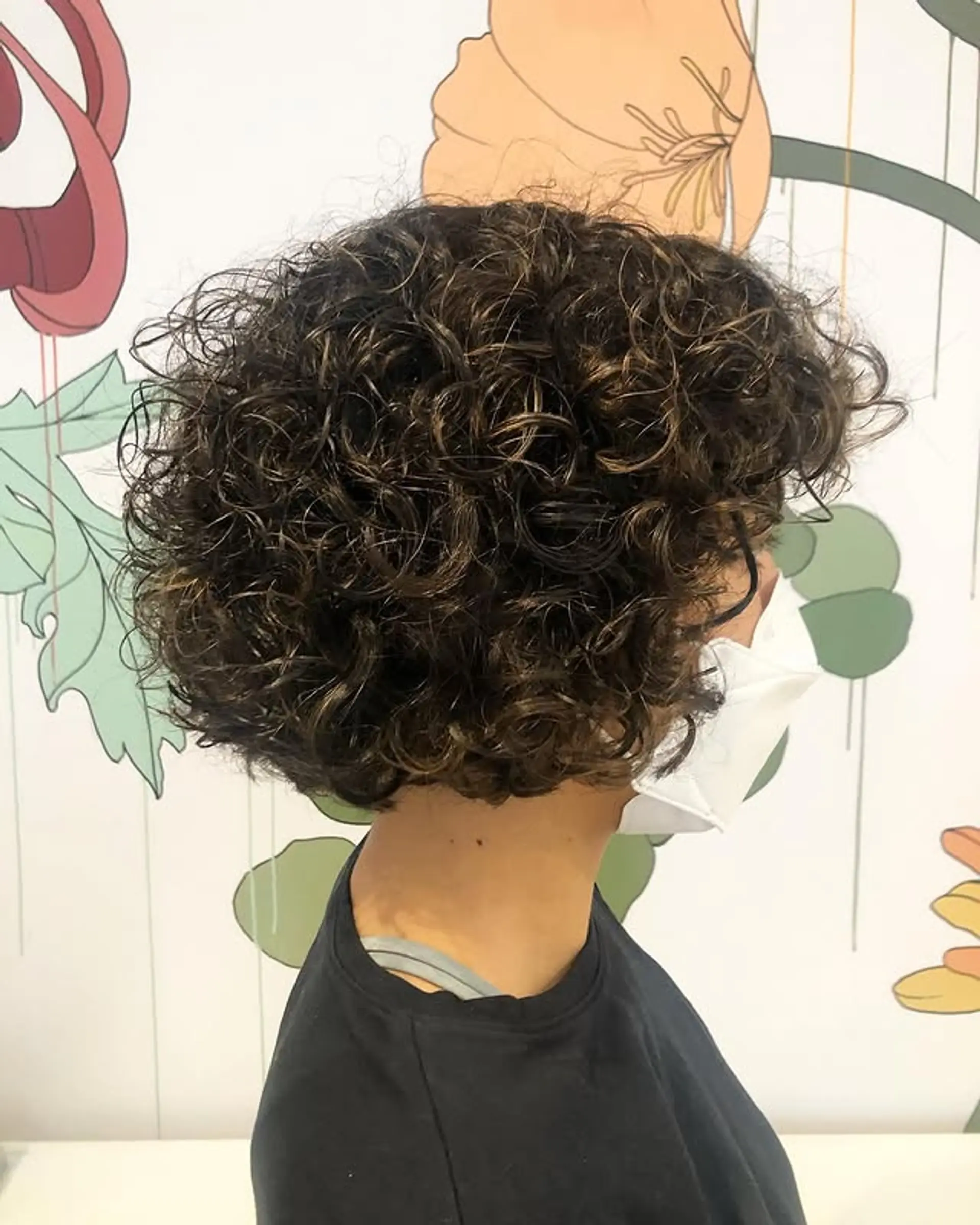 A bouncy, curly bob that accentuates natural texture and is easy to style. 1