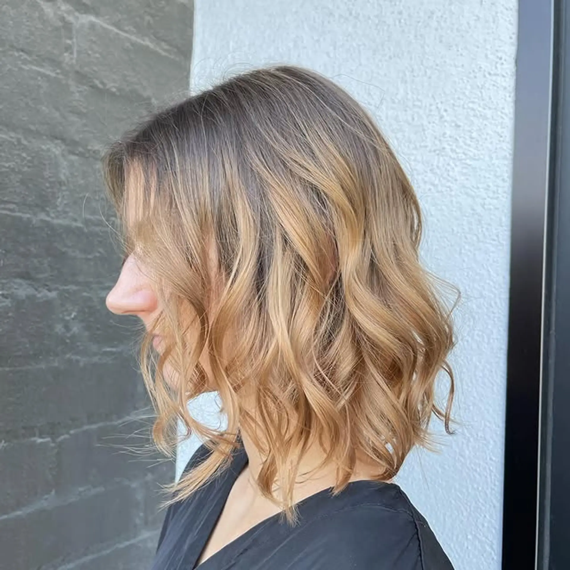 A wavy bob with caramel highlights. 1