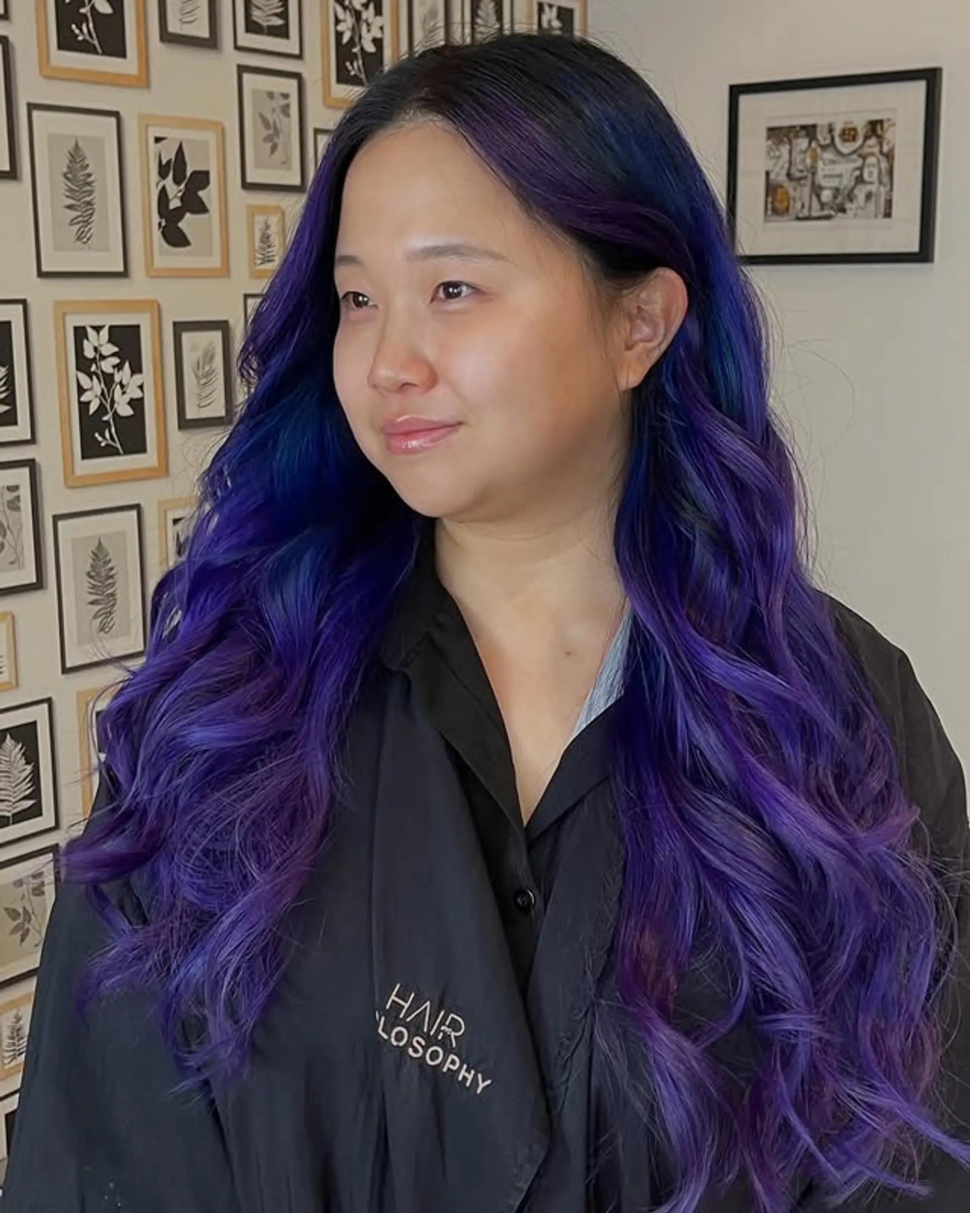 Long wavy hair with a vibrant blue and purple ombre. 1