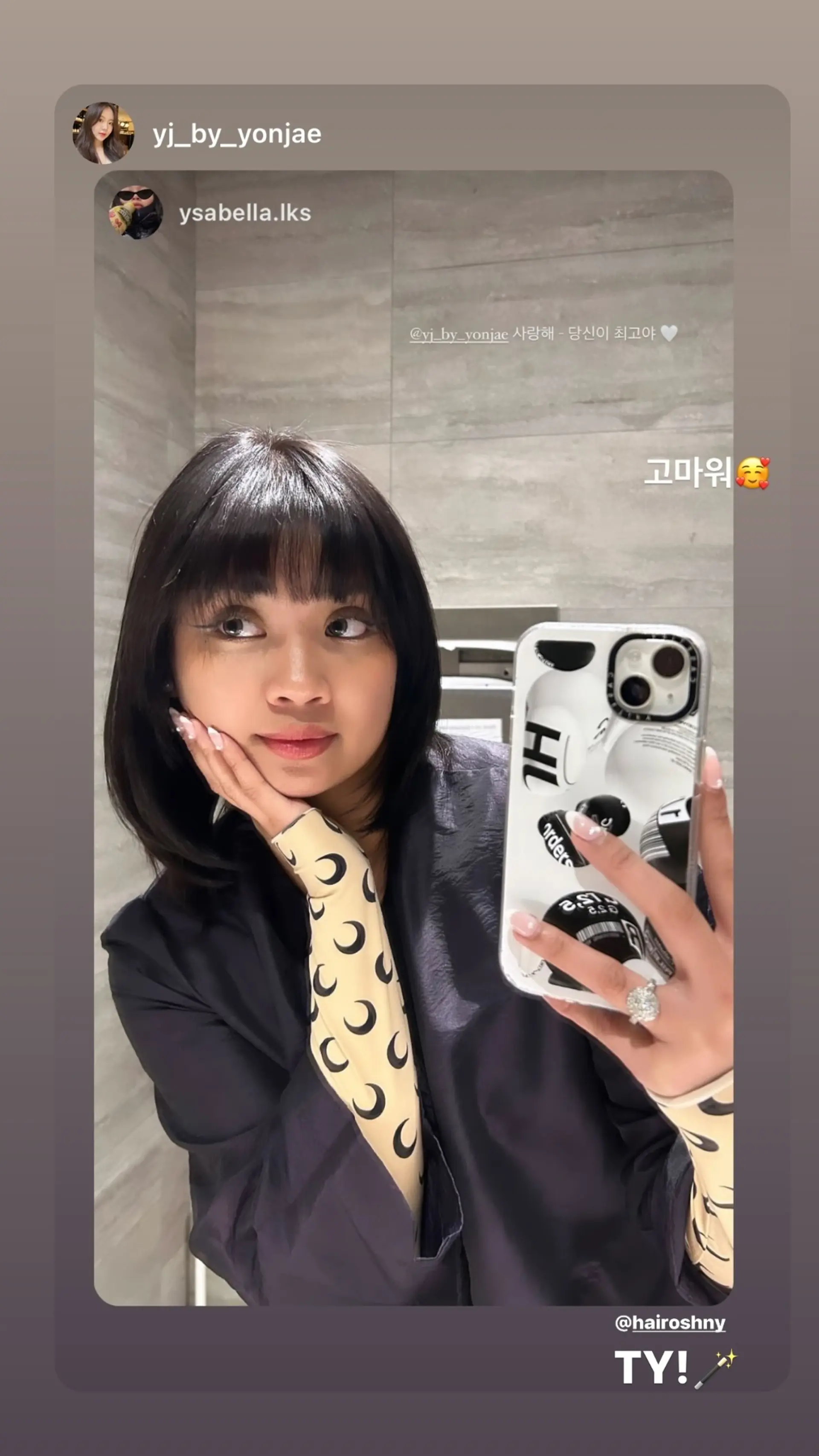 A blunt bob with straight across bangs. 1