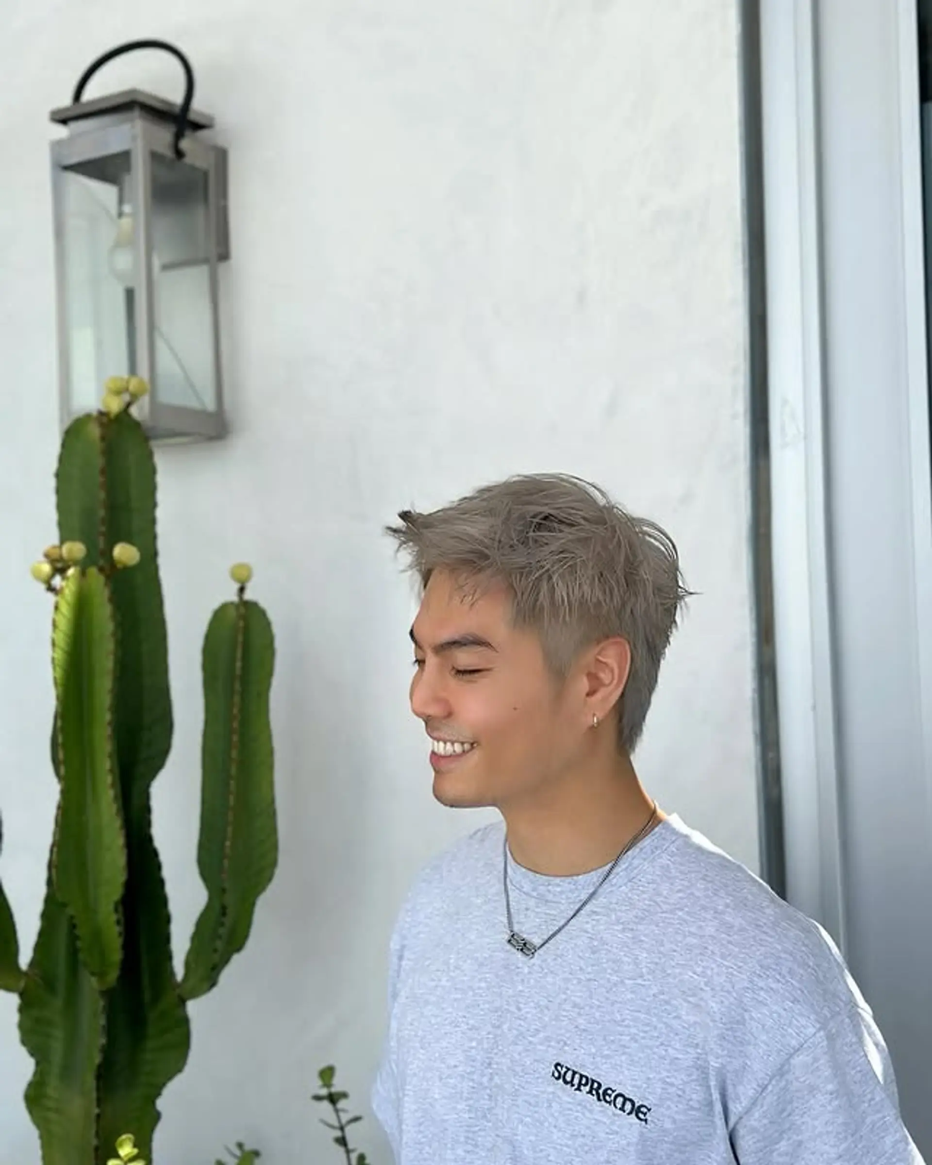 Short textured buzz cut with a styled, slightly messy finish. 1