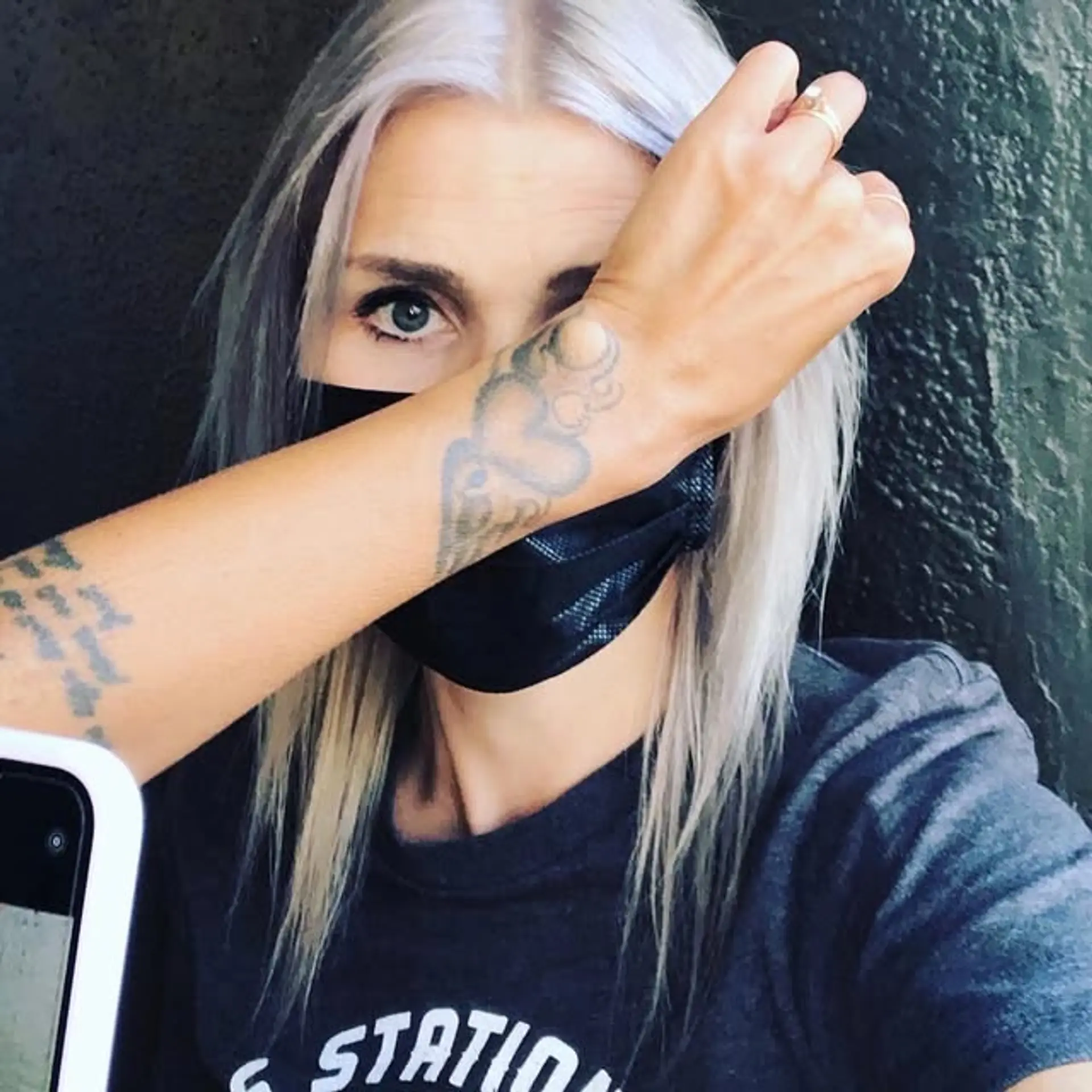 This medium-length lob features a cool-toned, dimensional icy blonde color. 1