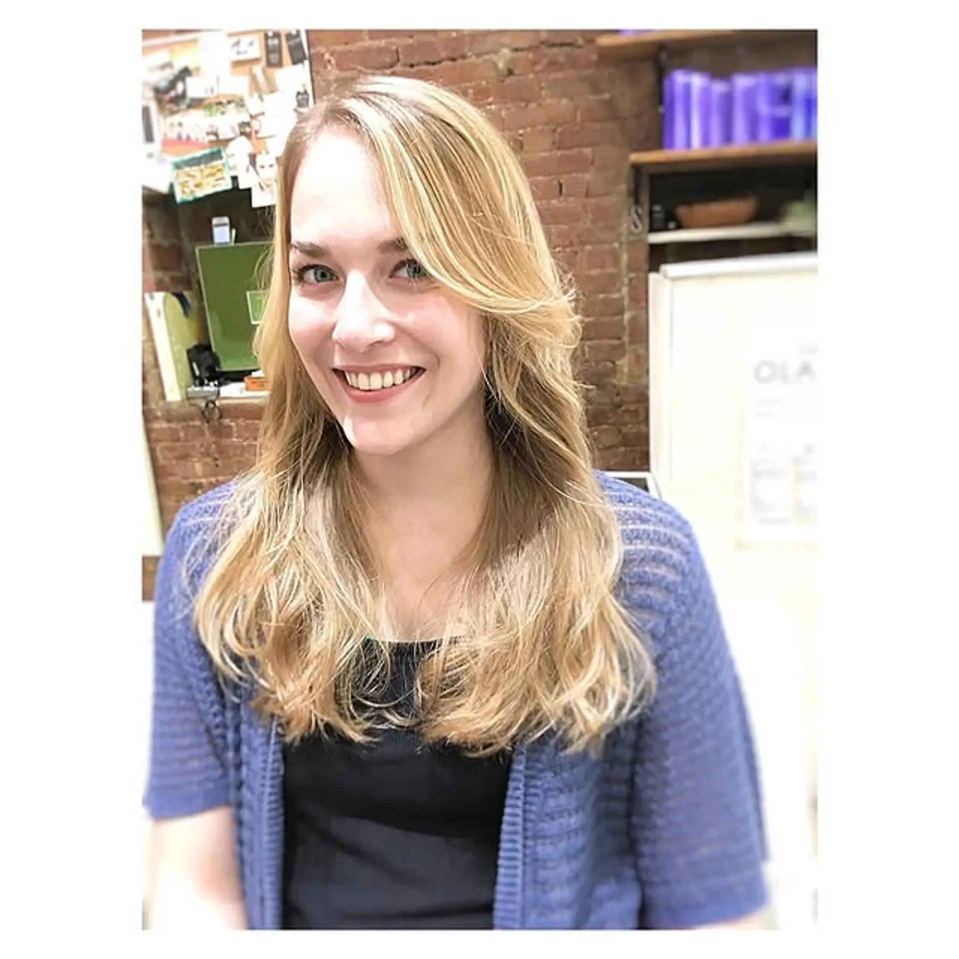 A long, layered hairstyle with soft, natural waves. 1