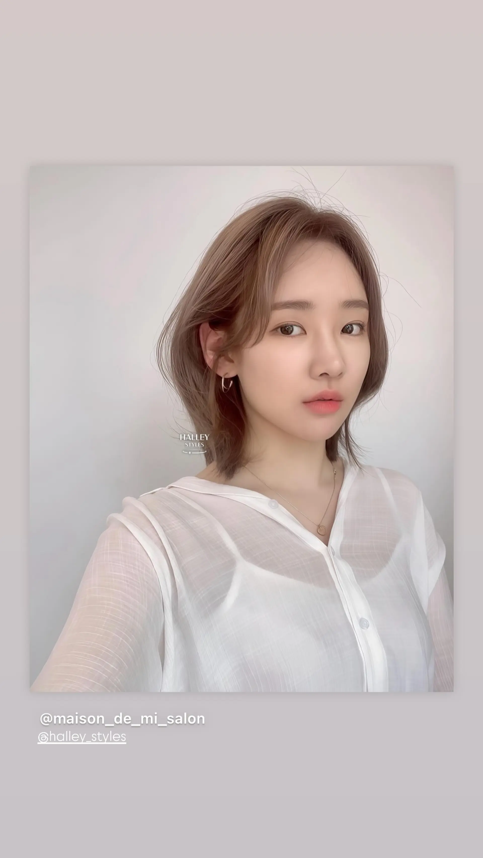 A modern bob with textured ends and soft, airy bangs. 1