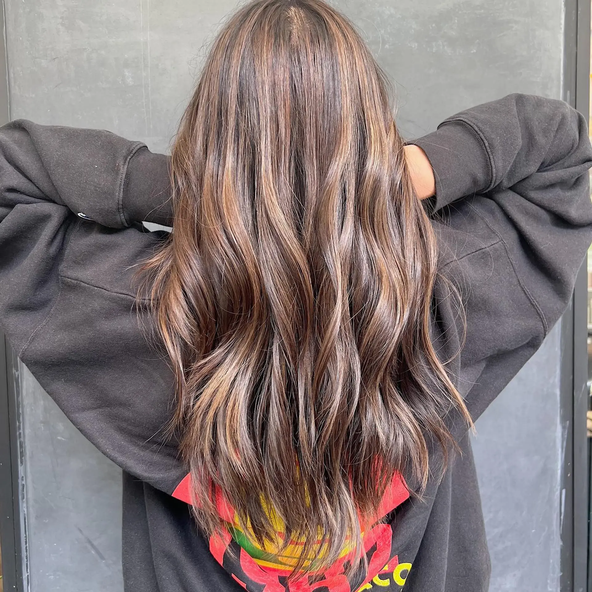 Long wavy hair with a soft caramel balayage. 1