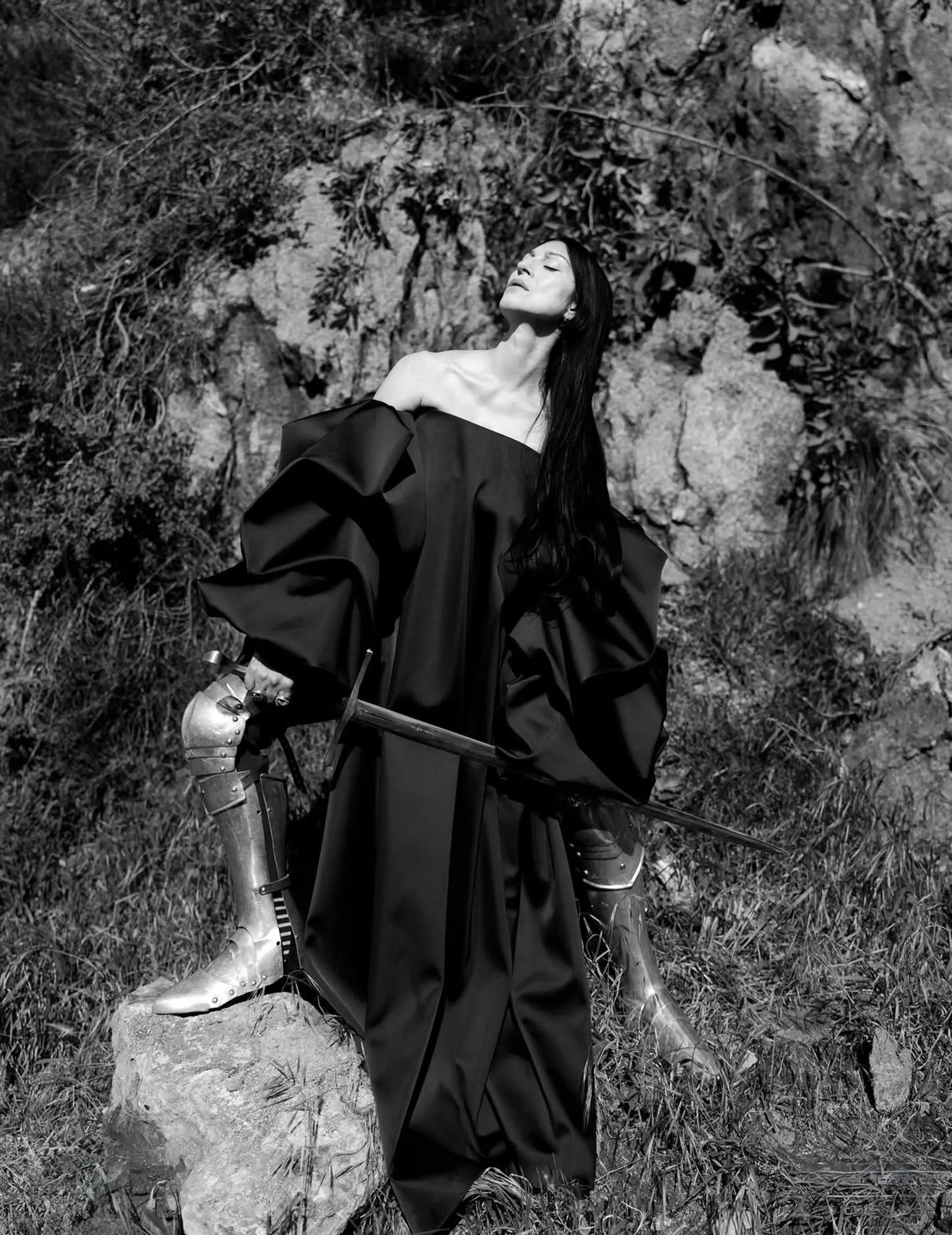 Long, sleek straight hair draped over one shoulder in an editorial styling. 1