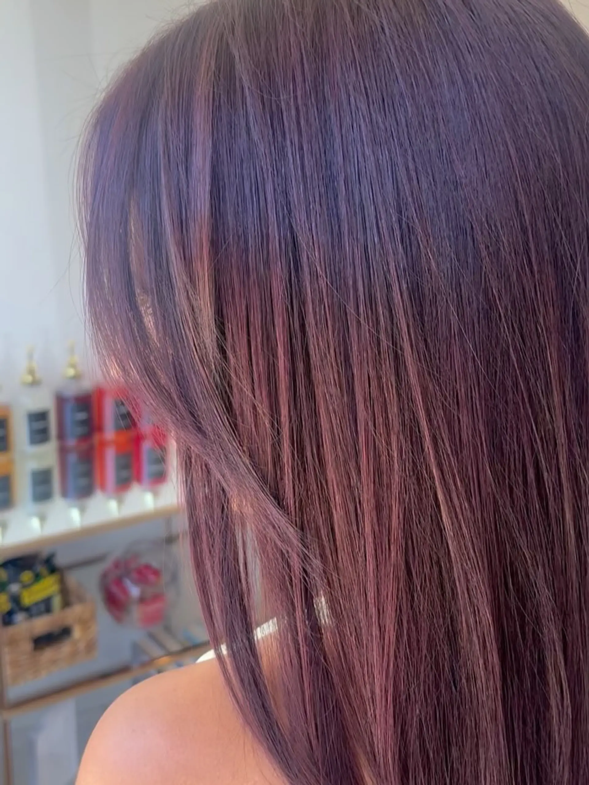Long, sleek straight hair with a deep cherry and violet-tinted tone. 1