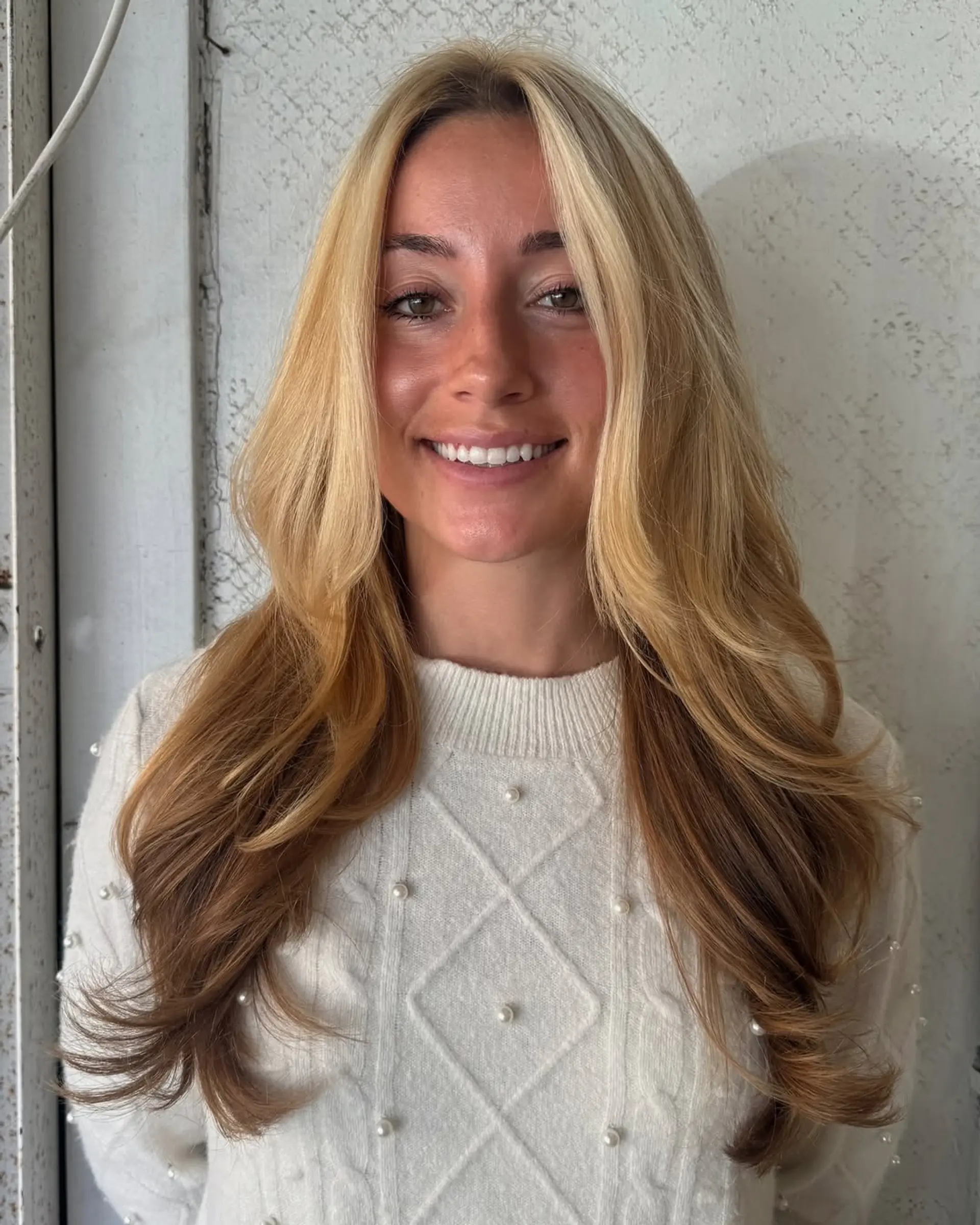 Long, straight hair with natural blonde and light brown tones, featuring soft layers and subtle highlights. 2