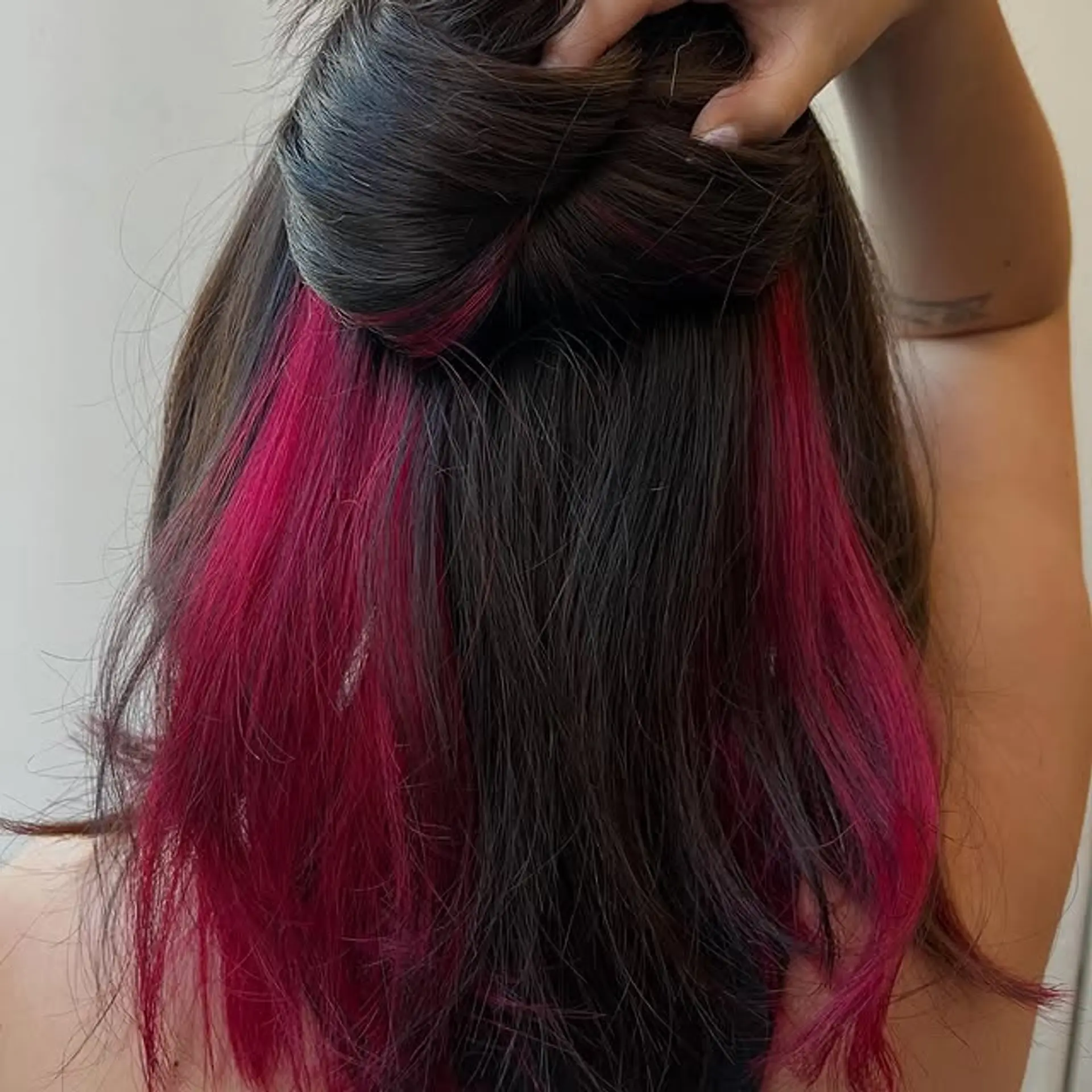Half updo with pink peekaboo streaks underneath. 1
