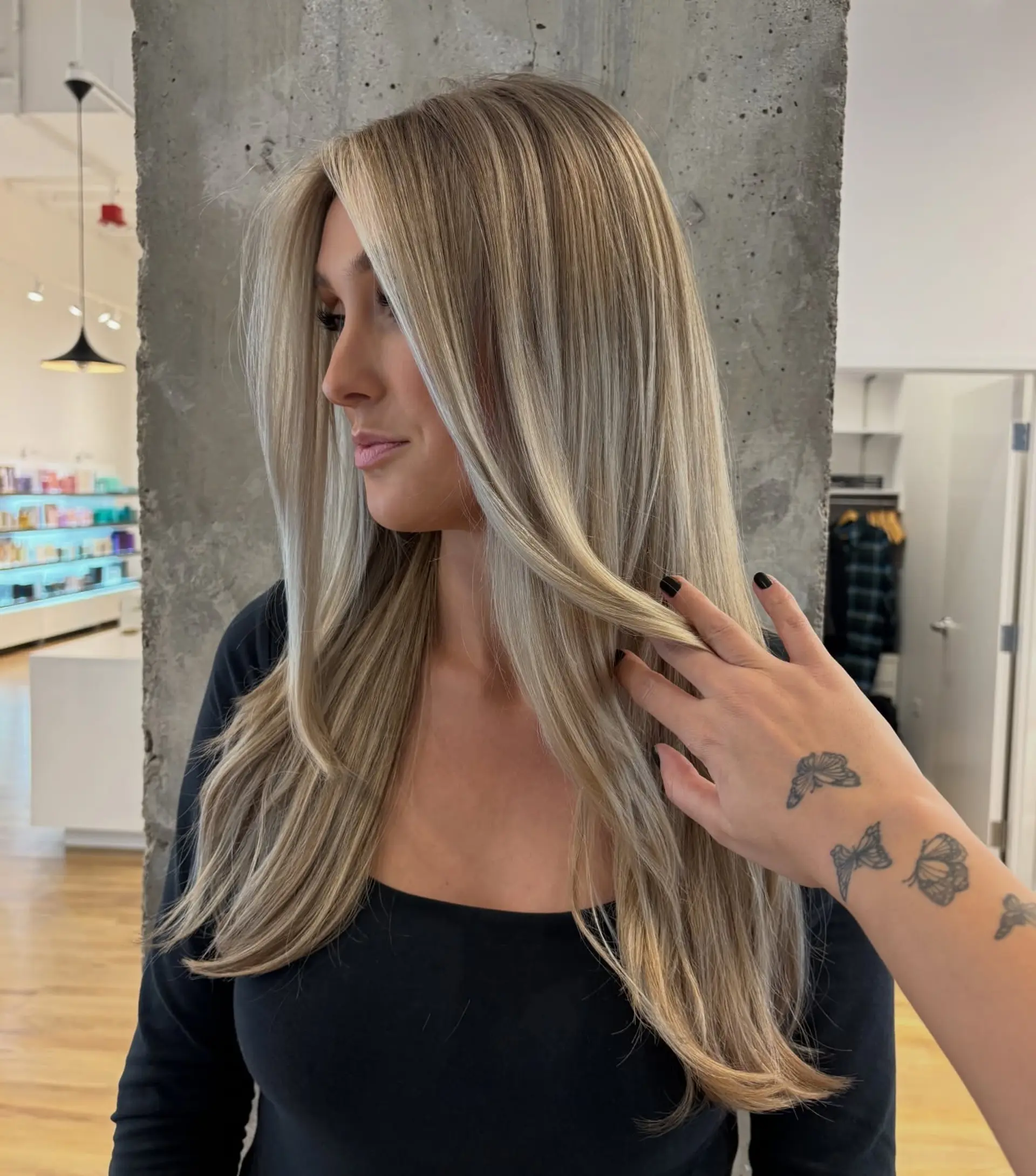 Long, straight ash blonde hair featuring bright face-framing highlights and dimensional lowlights. 1