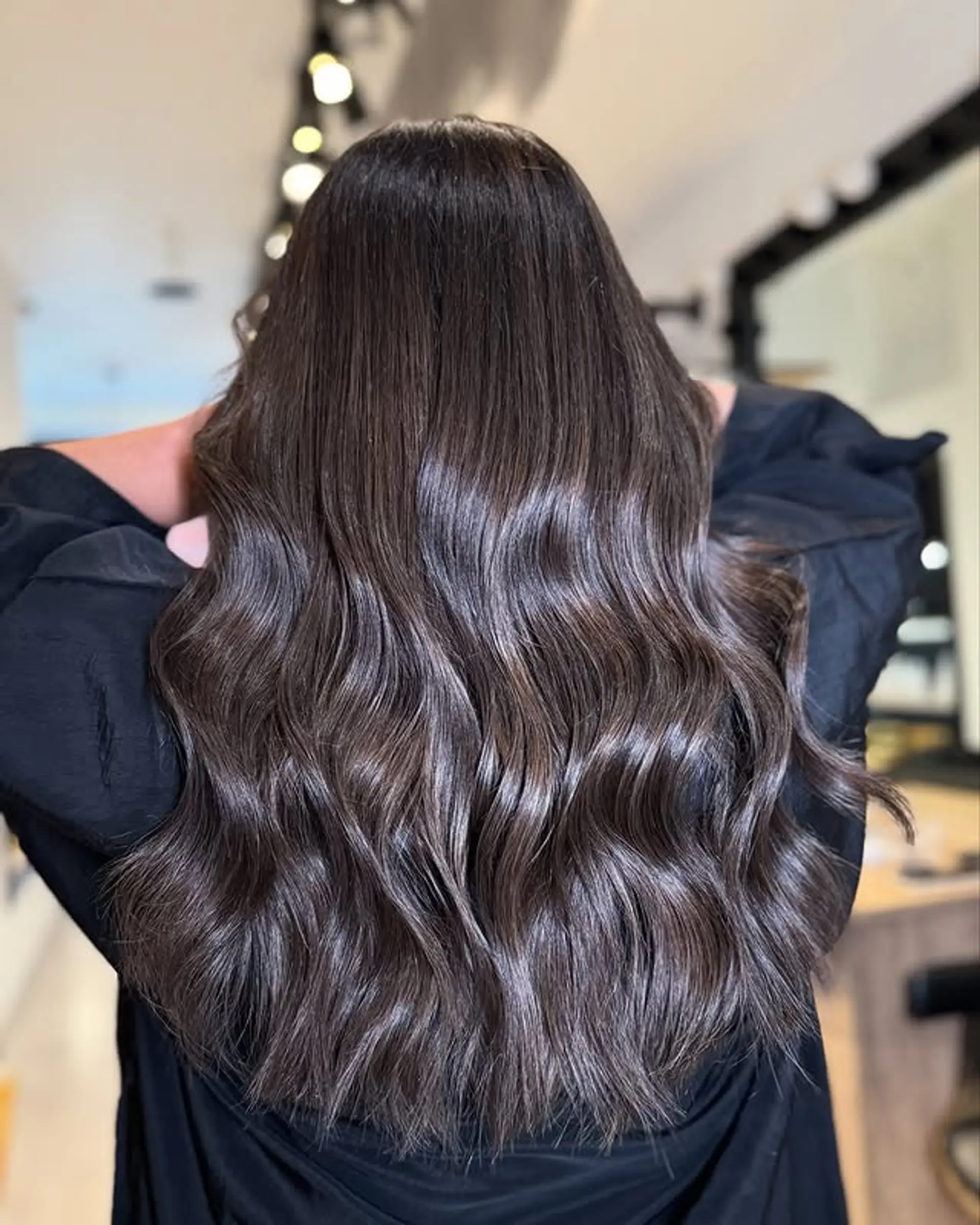 A long, wavy hairstyle with defined waves. 1
