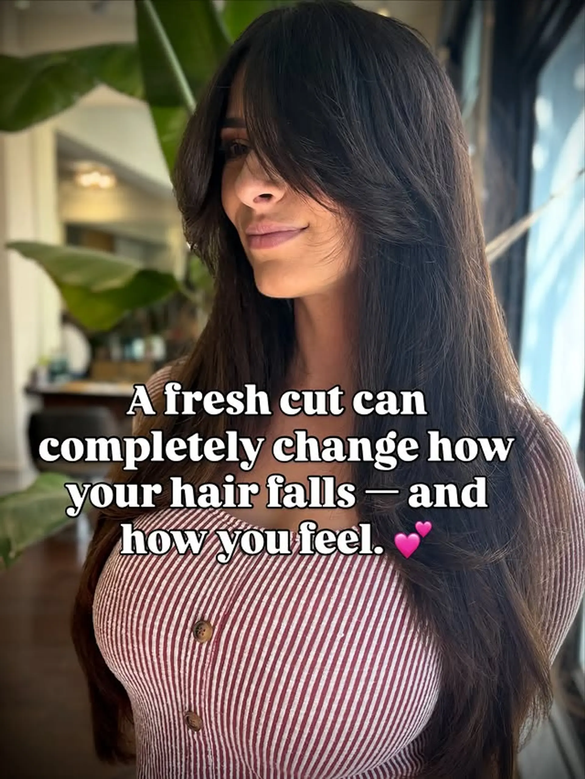 Long layered cut with face-framing layers and curtain bangs. 1